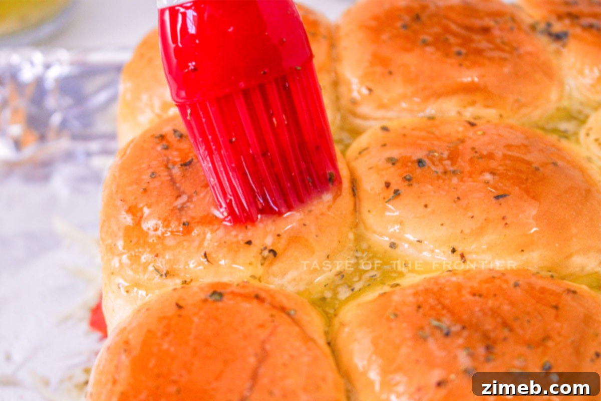 Pizza Bites 6 Brush on the seasoning and butter for Pizza Sliders