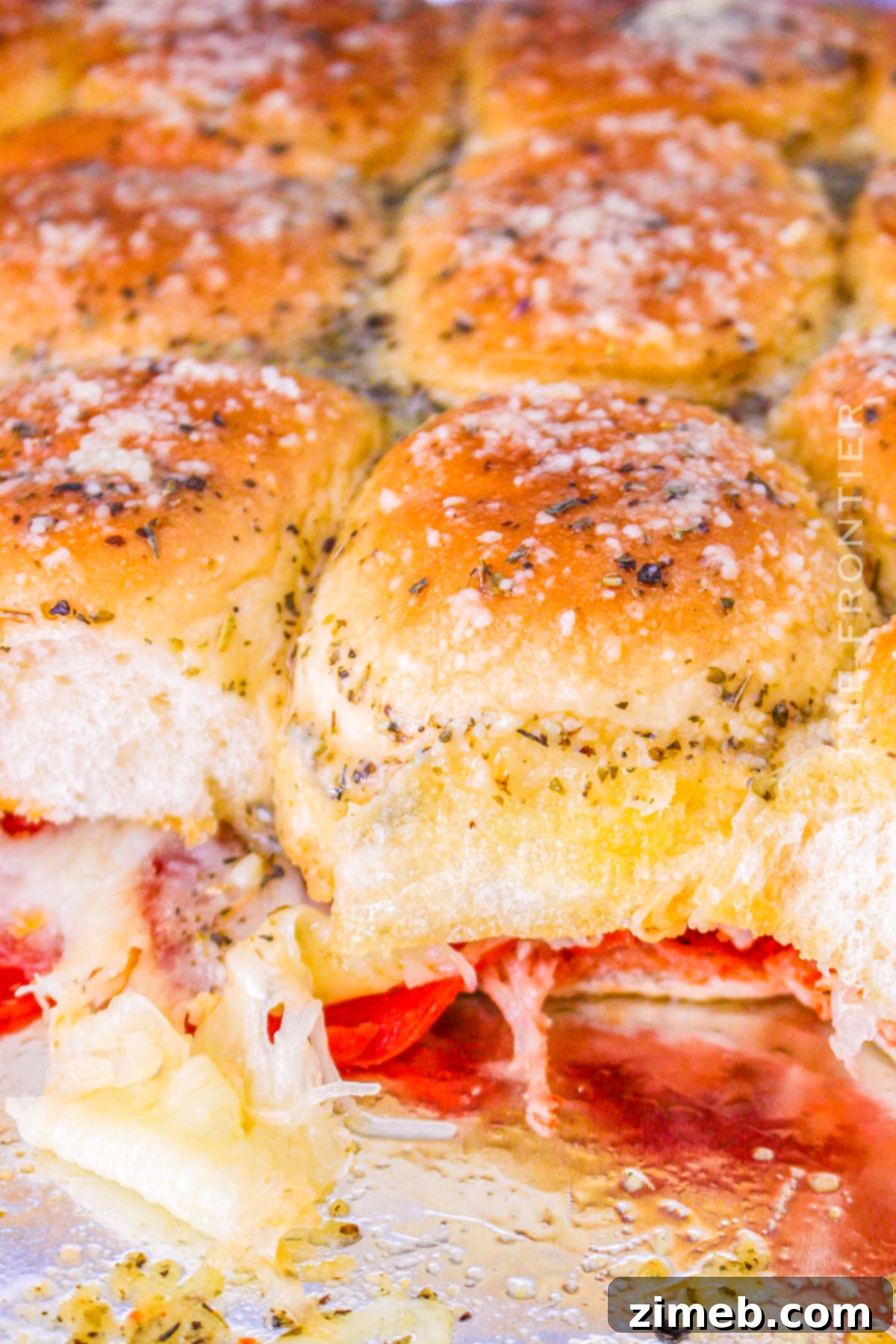 Pizza Bites 9 Game day sliders with melted cheese and pepperoni