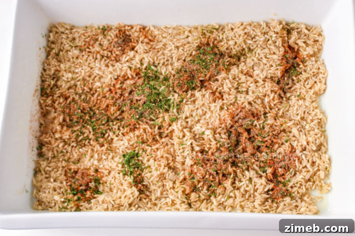 Wholesome Chicken and Brown Rice Bake 6 adding the seasoning