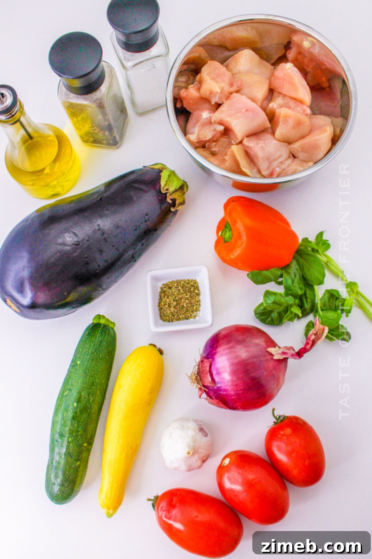 Fresh ingredients for Sheet Pan Chicken Ratatouille laid out