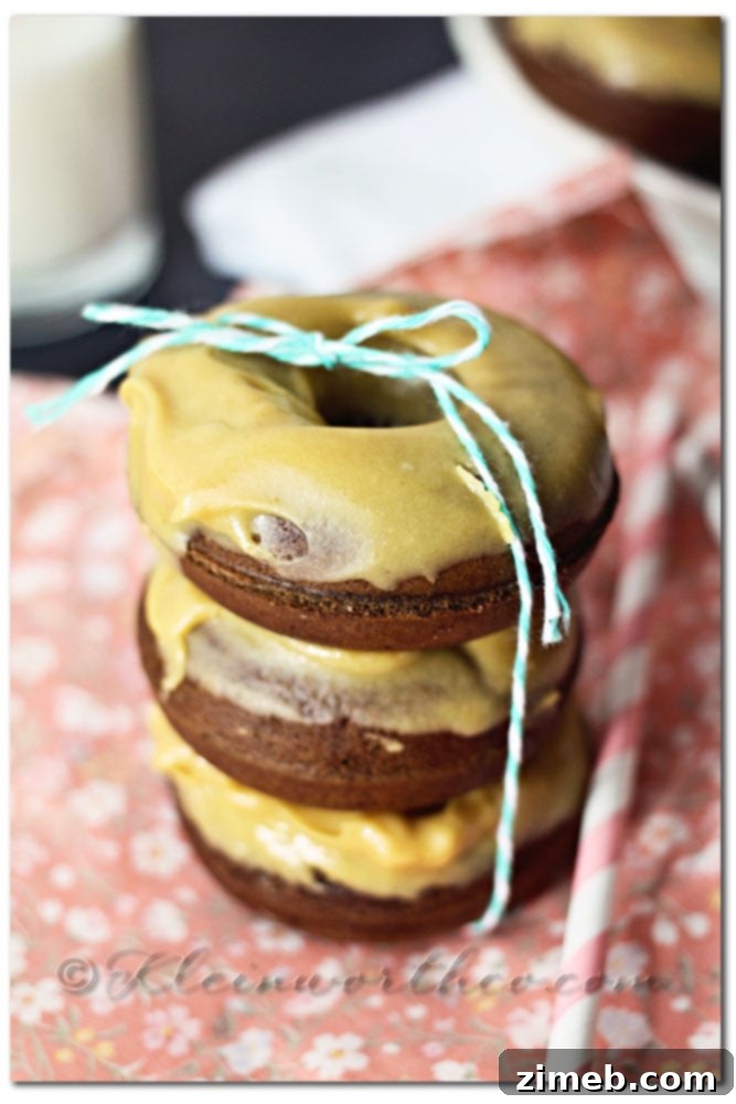 Homemade Chocolate Cake Donuts with Peanut Butter Glaze Stacked