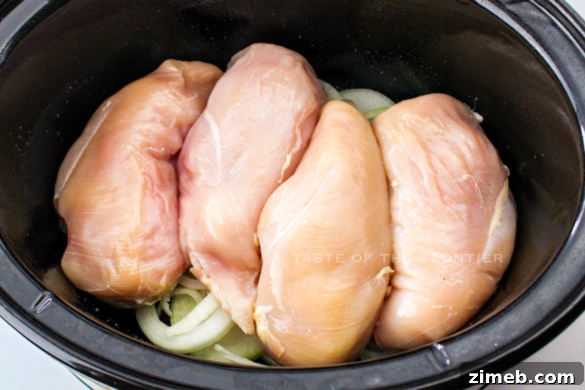 Savory French Onion Chicken 5 making chicken with onions in the slow cooker