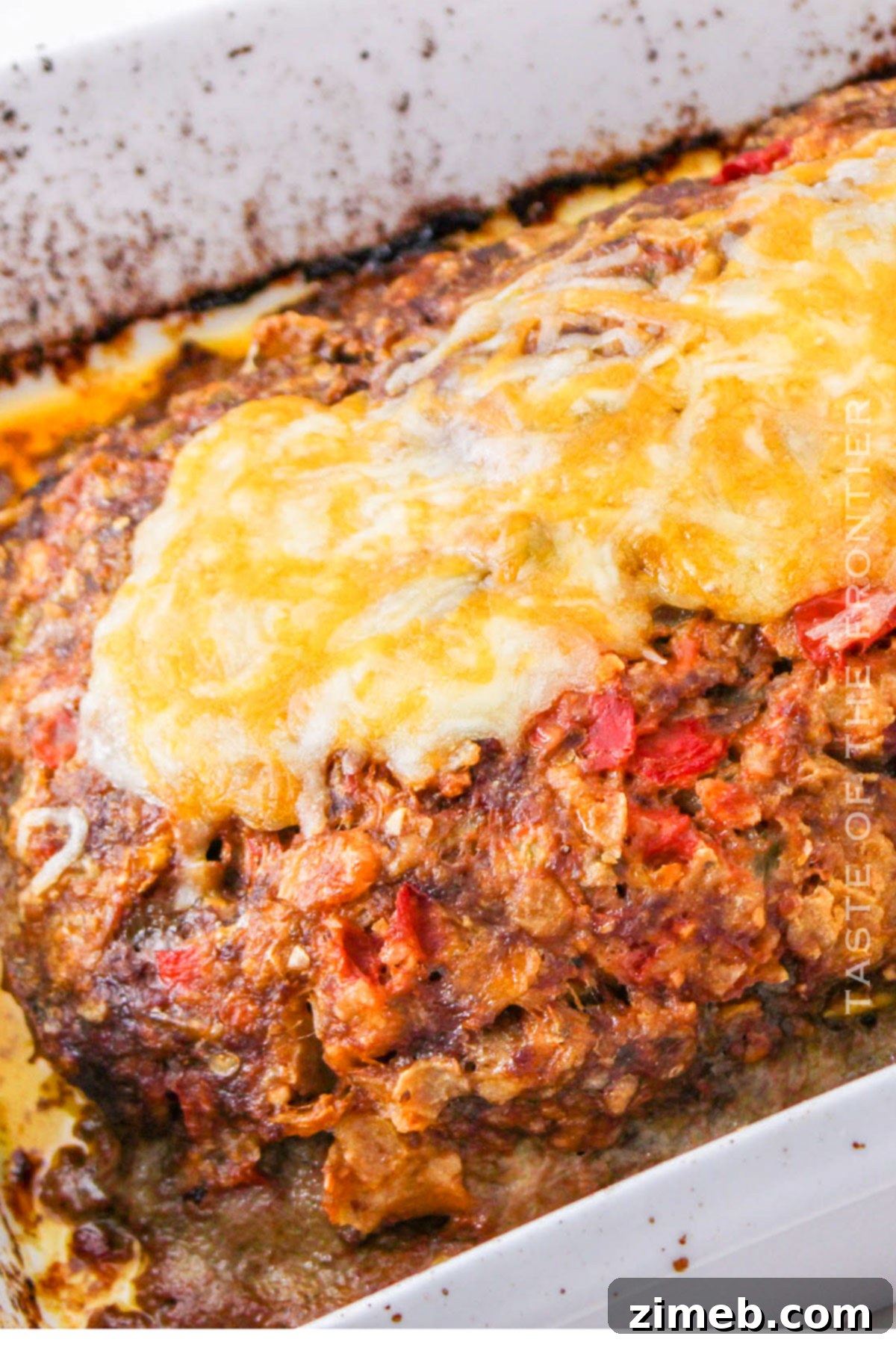 Fiesta Meatloaf 8 Baked Mexican Meatloaf with melted cheese, ready to serve
