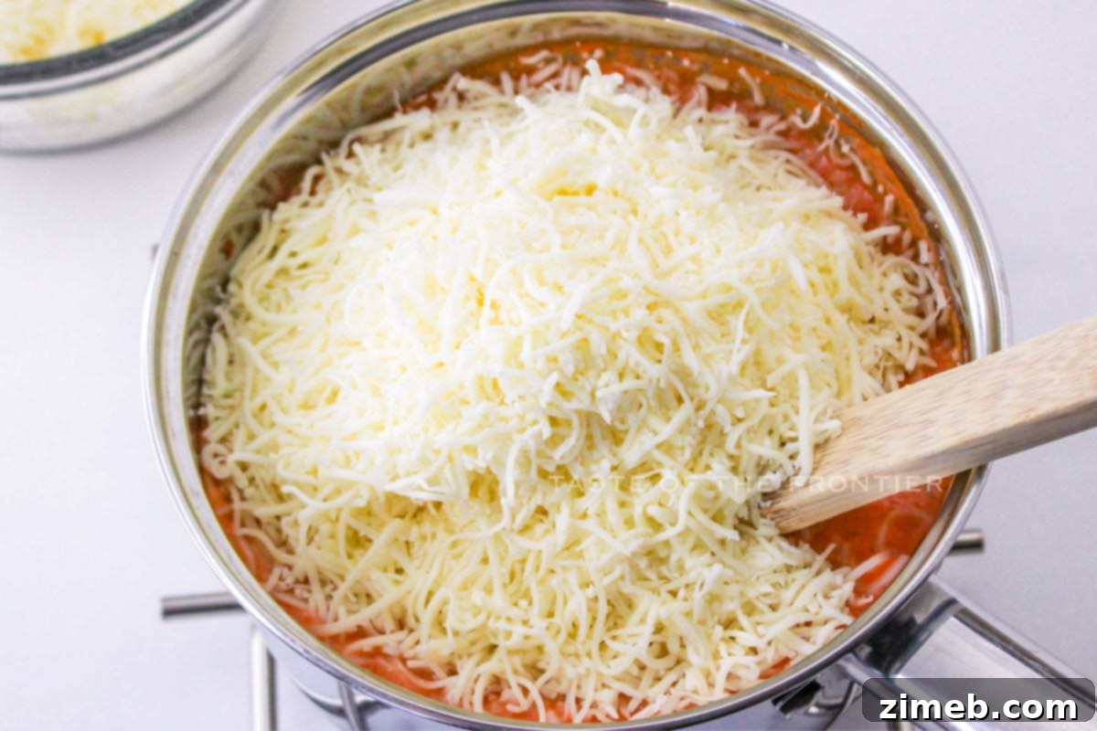 Making the cheesy sauce for the baked ziti