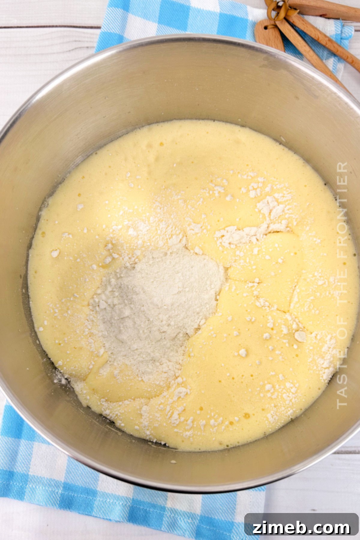 Lemon Roll Cake 4 Preparing lemon cake batter for a roll cake