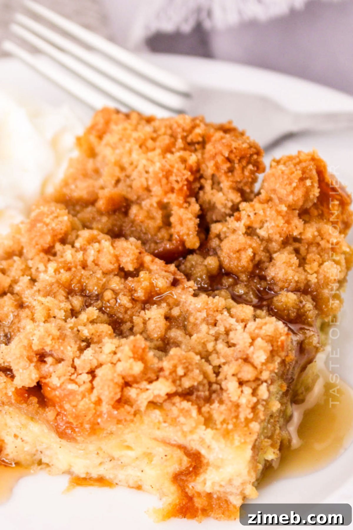 Buttery, golden Croissant French Toast casserole ready to be served for breakfast or brunch.