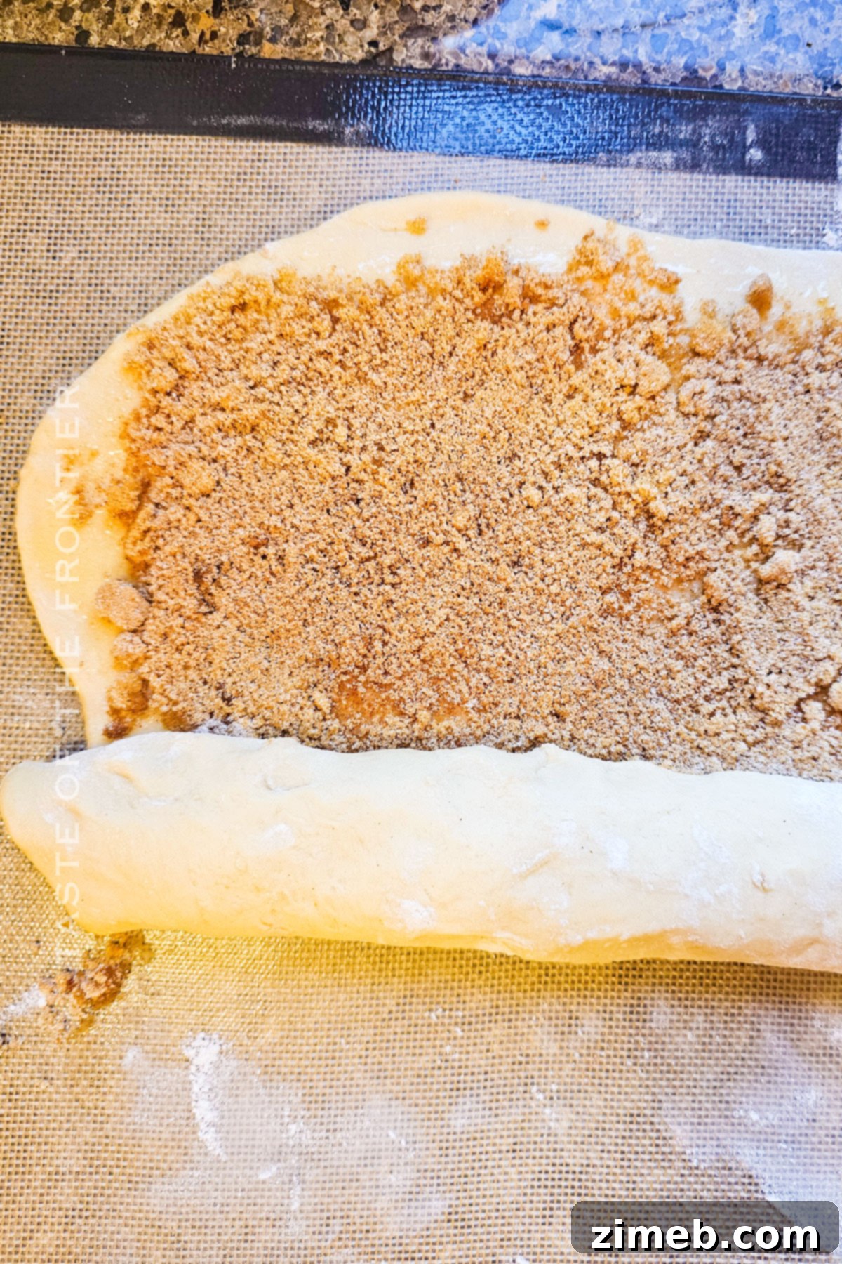 Weekend Morning Cinnamon Rolls 6 How to make Small Batch Cinnamon Rolls, showing the dough being spread with filling