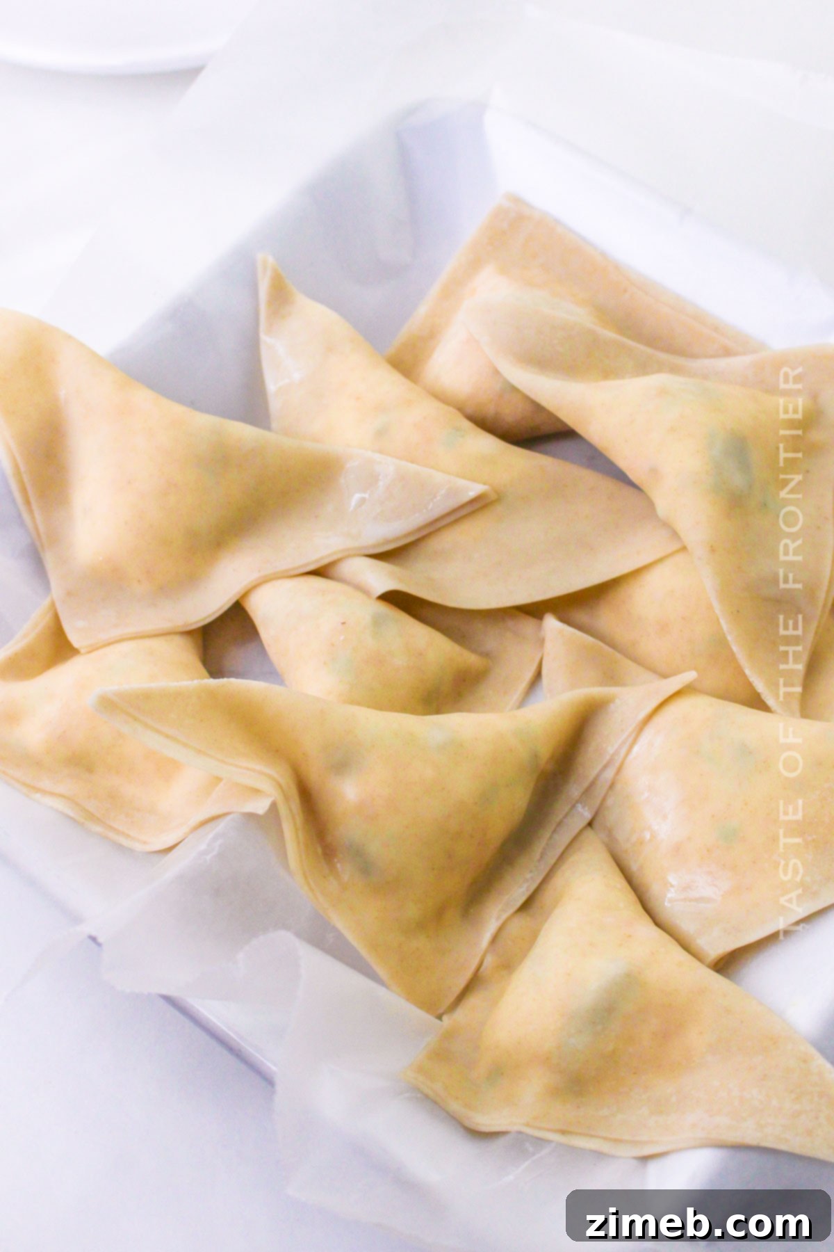 Golden Jalapeño Wonton Bursts 7 wontons ready to fry