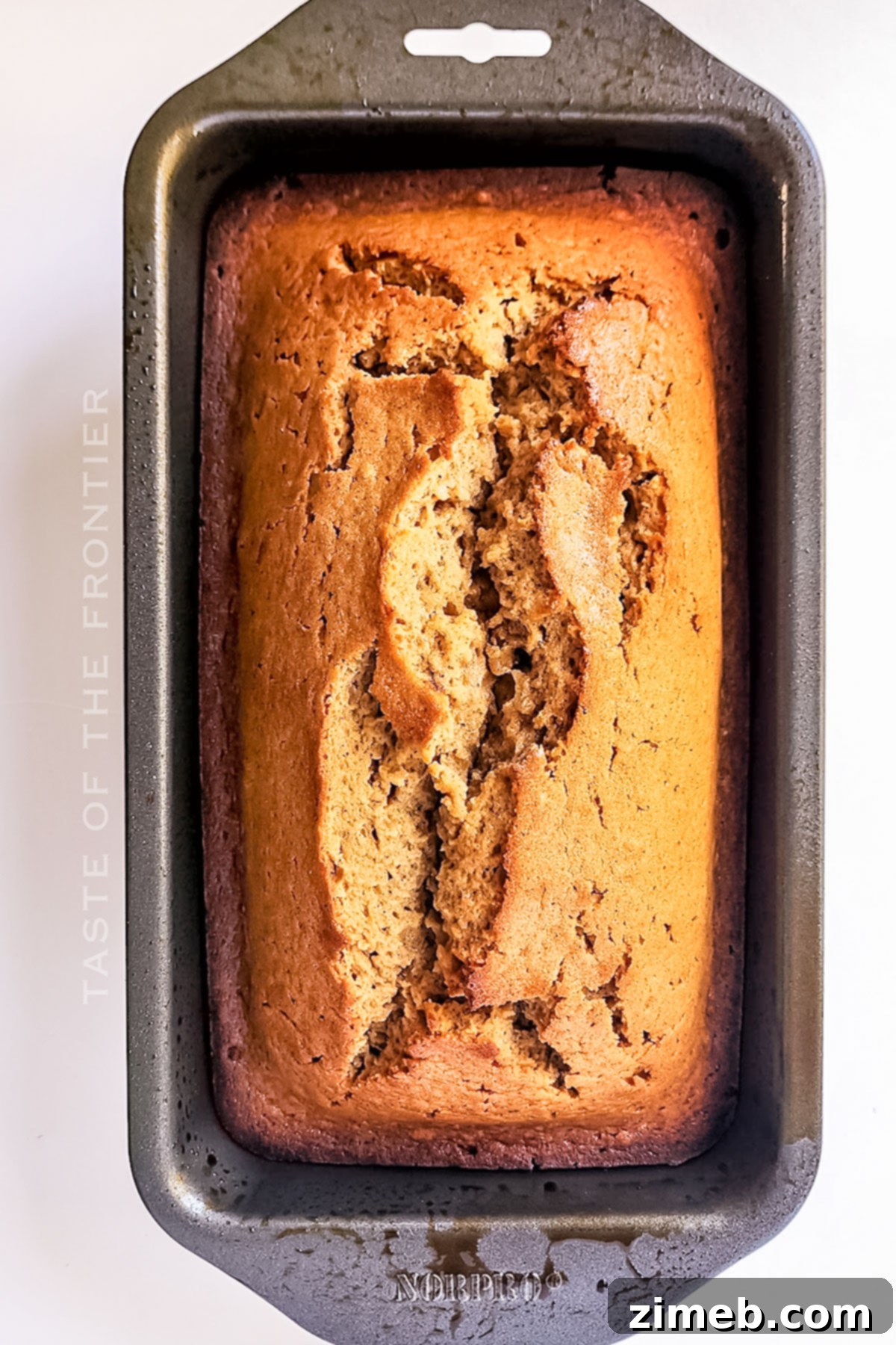Golden Brown Butter Pound Cake 8 Sliced Brown Butter loaf on a cutting board