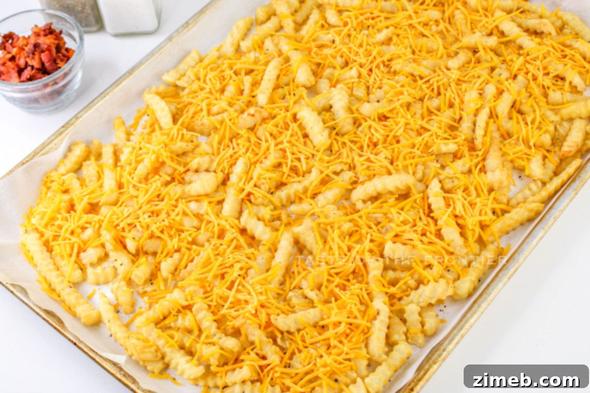 Epic Loaded Fries 5 baking on the sheet pan