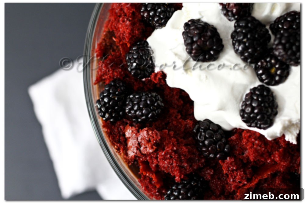 Red Velvet Blackberry Surge Cake 4 Red Velvet Blackberry Crash Cake showing layers of cake, pudding, cool whip, and berries