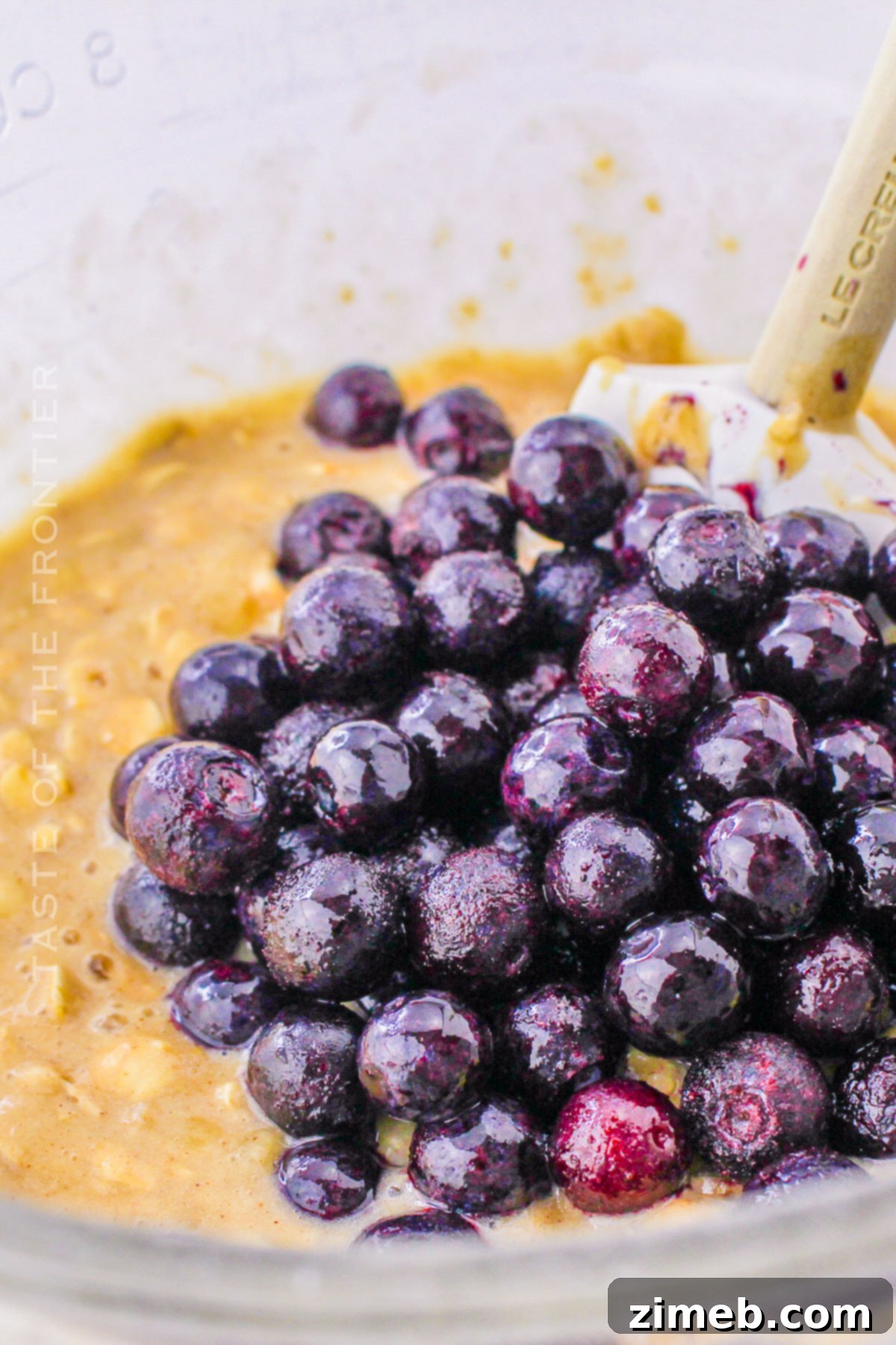 Banana Blueberry Oat Muffins 5 adding berries to the batter