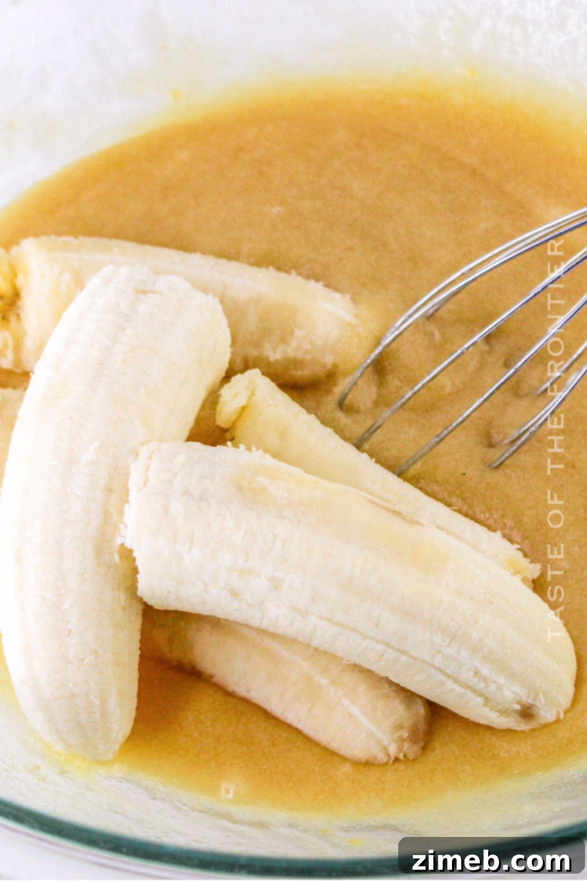 Mashing ripe bananas for muffins