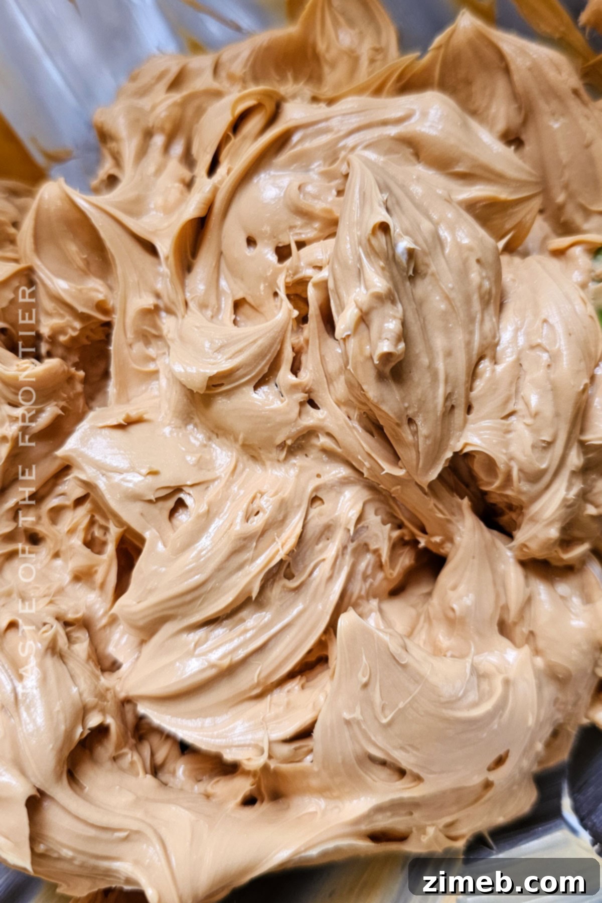 Creamy whipped dulce de leche filling, a key component of Chocotorta.