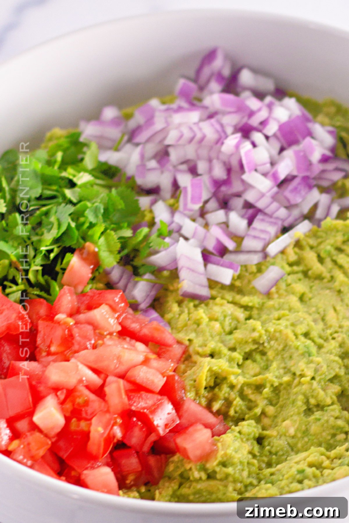 Ultimate Creamy Guacamole 6 mashed avocado with mix-ins