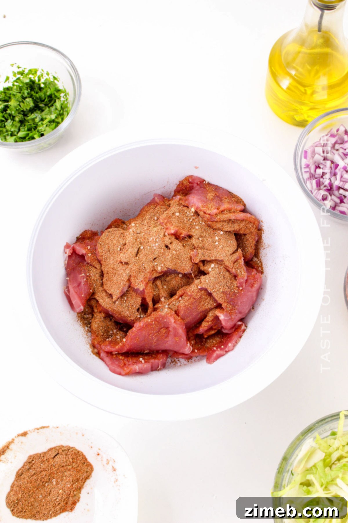 Carnitas Street Tacos 6 adding seasonings