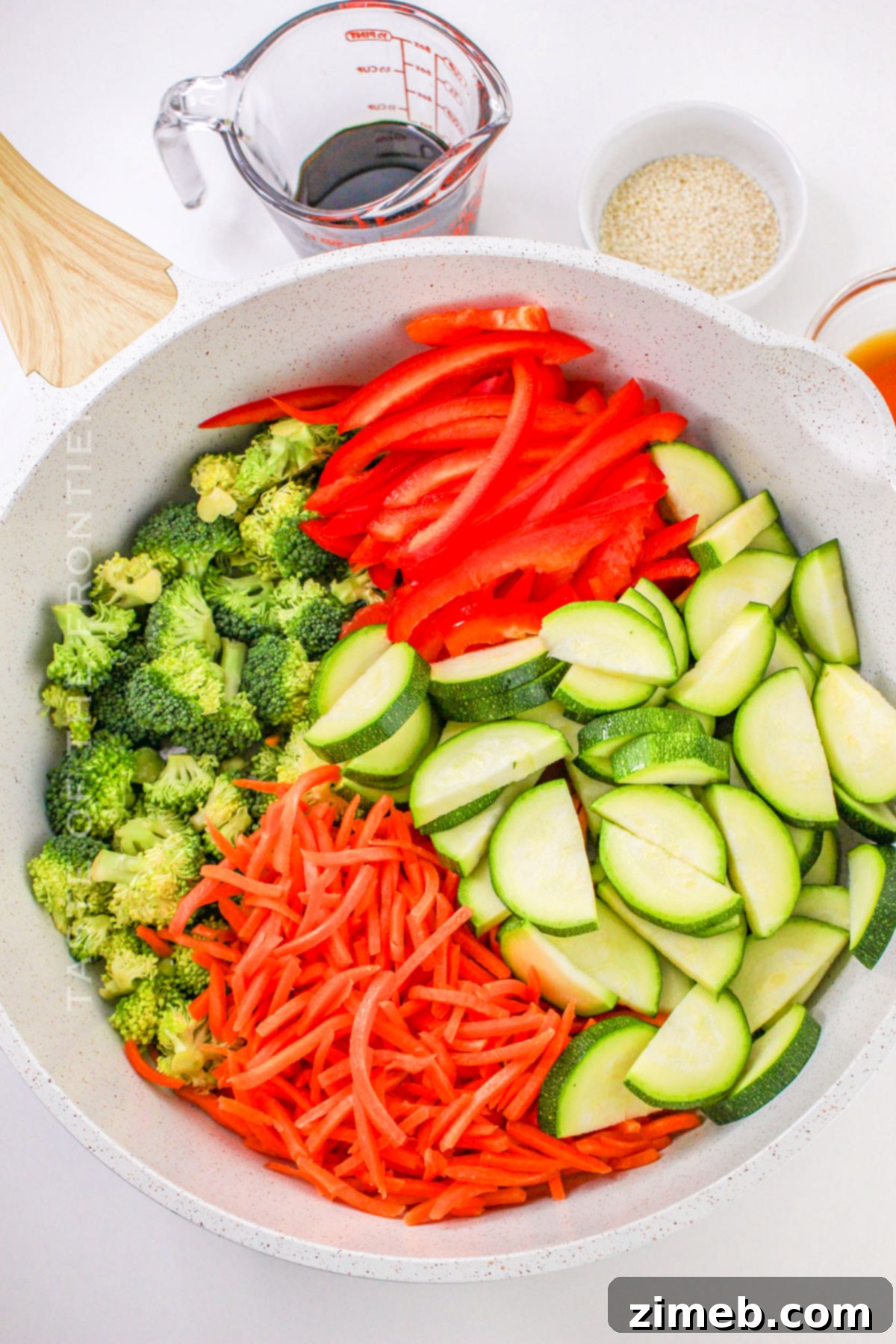 Garden Fresh Noodle Stir-Fry 5 Tossing the vegetables for cooking in a wok
