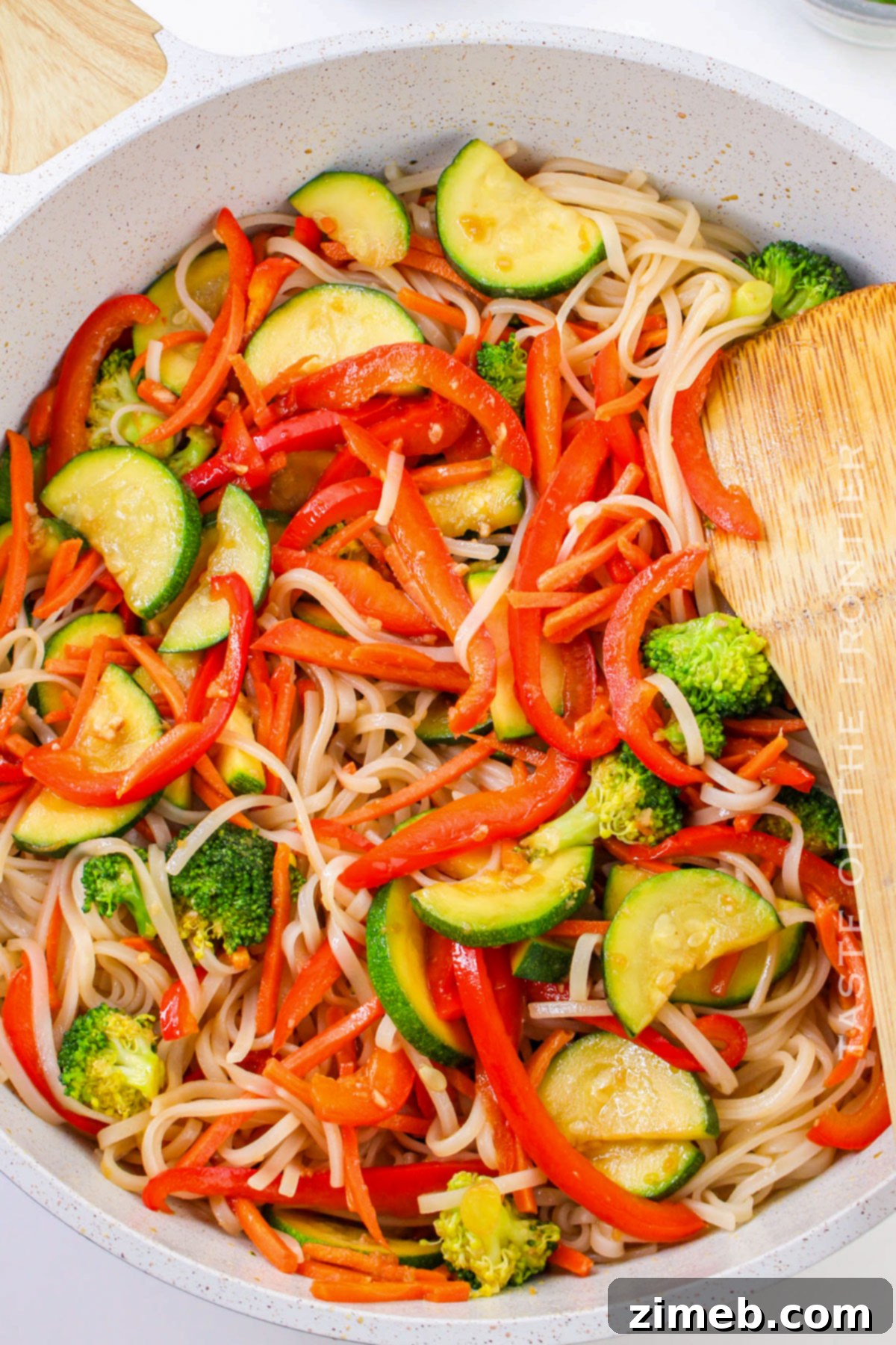 Garden Fresh Noodle Stir-Fry 8 Mixing the veggies and noodles for a delicious stir fry
