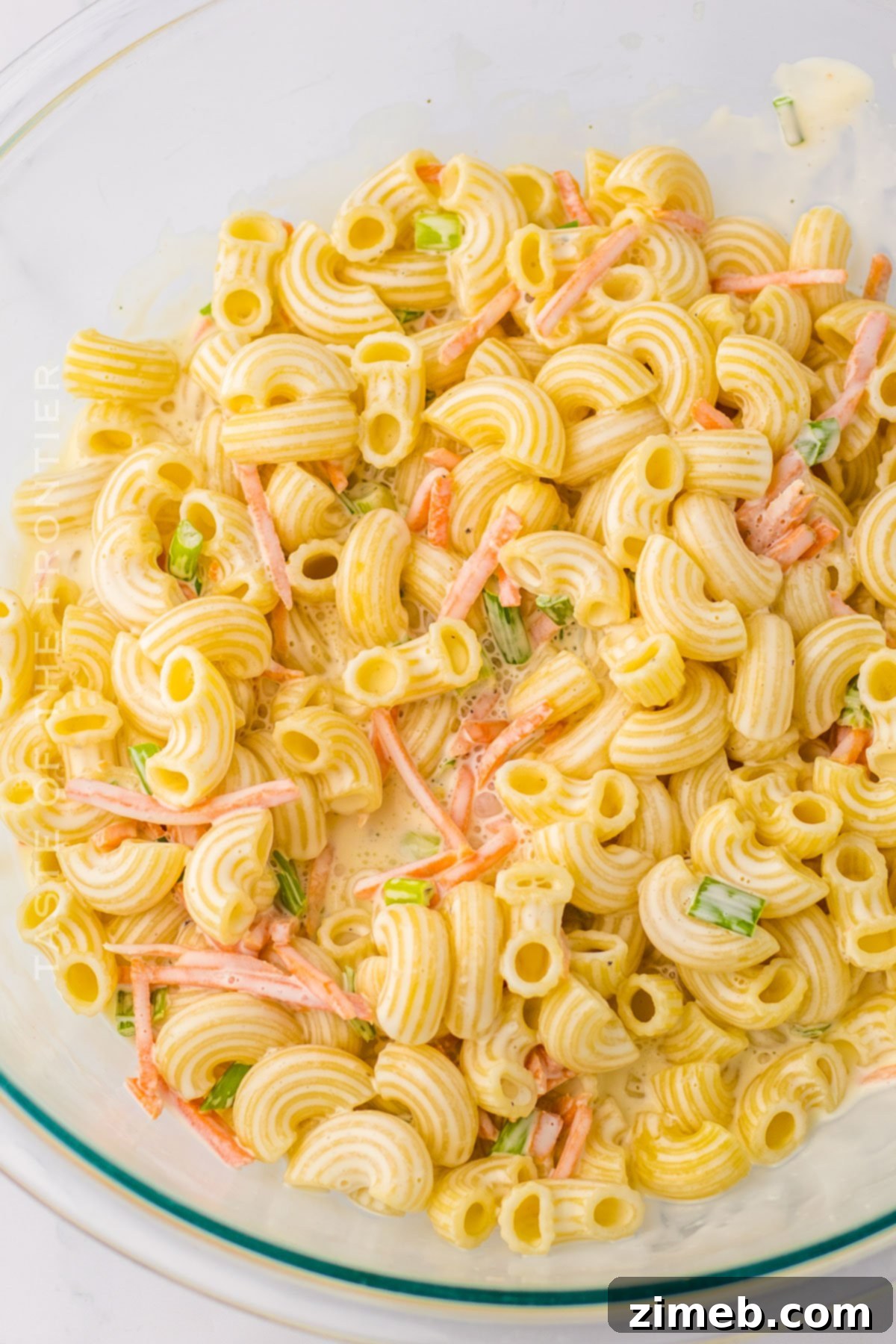 Creamy Hawaiian Macaroni Salad 6 How to make Hawaiian Macaroni Salad, showing the process.