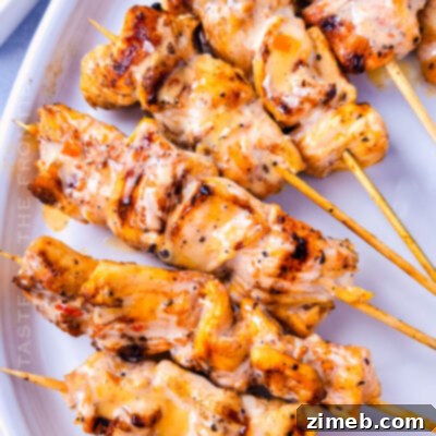 Bang Bang Chicken Skewers, a delicious grilled chicken recipe with a creamy, spicy sauce.