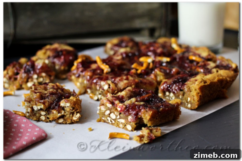 Blackberry Marmalade Pretzel Blondies - Close-up of blondies with marmalade swirls