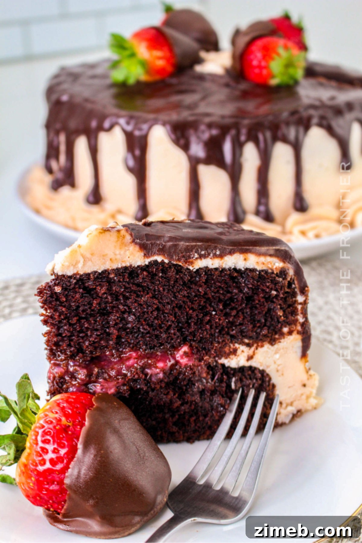 Chocolate Covered Strawberry Cake showcasing layers and ganache drip