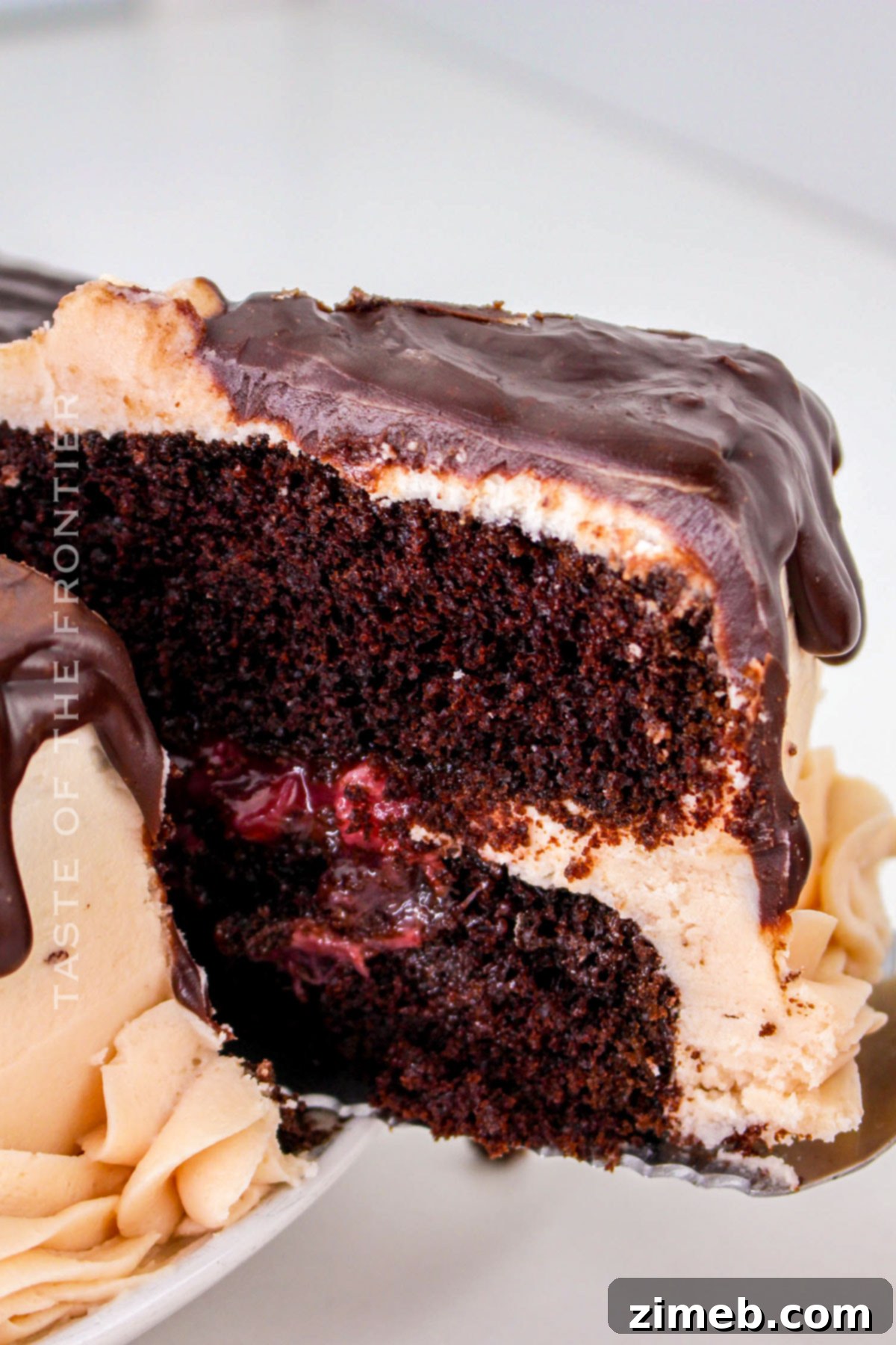 Slice of Chocolate Covered Strawberry Cake on a plate