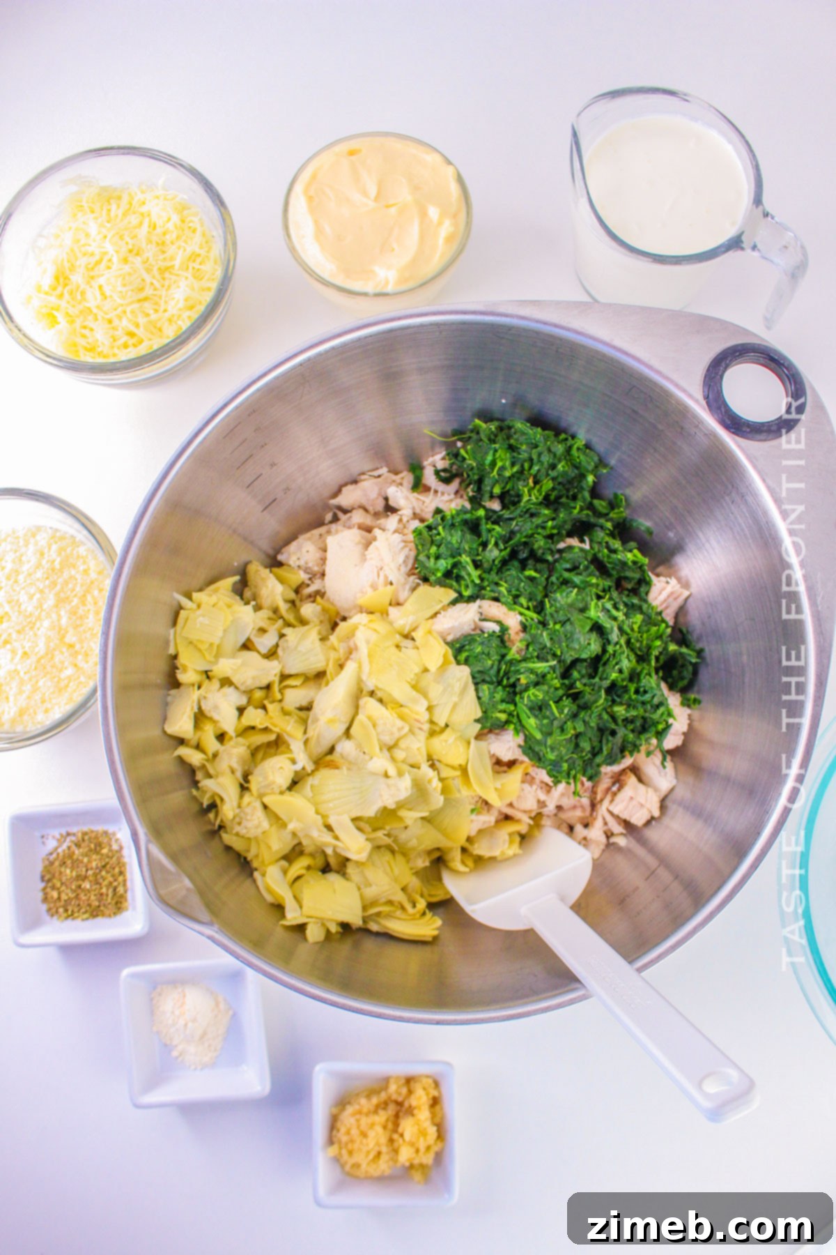 Creamy Spinach Artichoke Chicken Casserole 5 making chicken casserole with artichokes