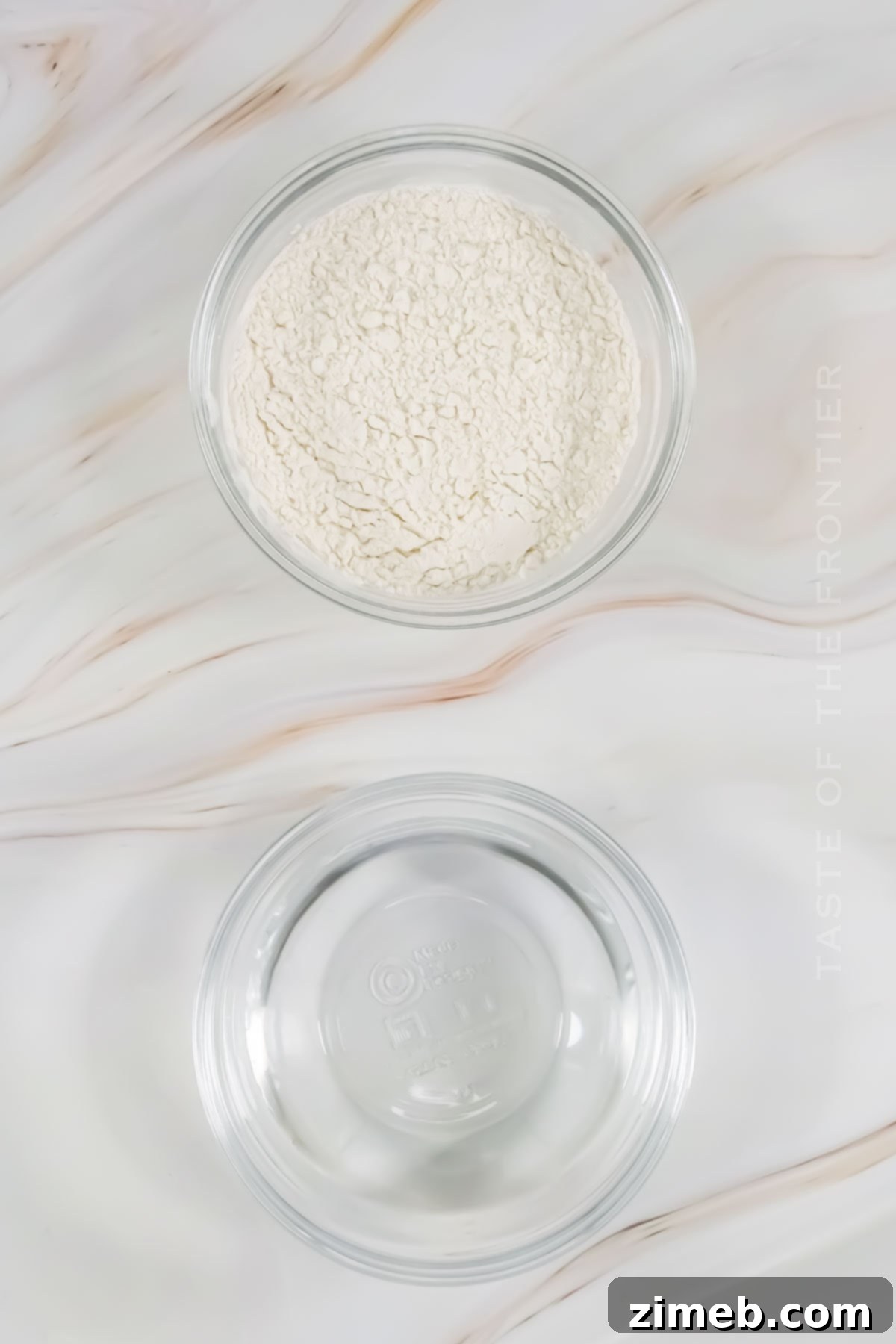 Bringing Your Sourdough to Life 3 Sourdough Starter ingredients: flour and water in bowls, ready to be mixed.