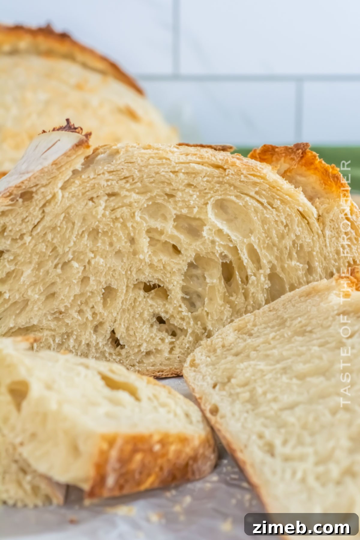 Bake Your Own Sourdough Masterpiece 15 A beautifully scored basic sourdough loaf, ideal for beginners, ready to be baked to perfection.