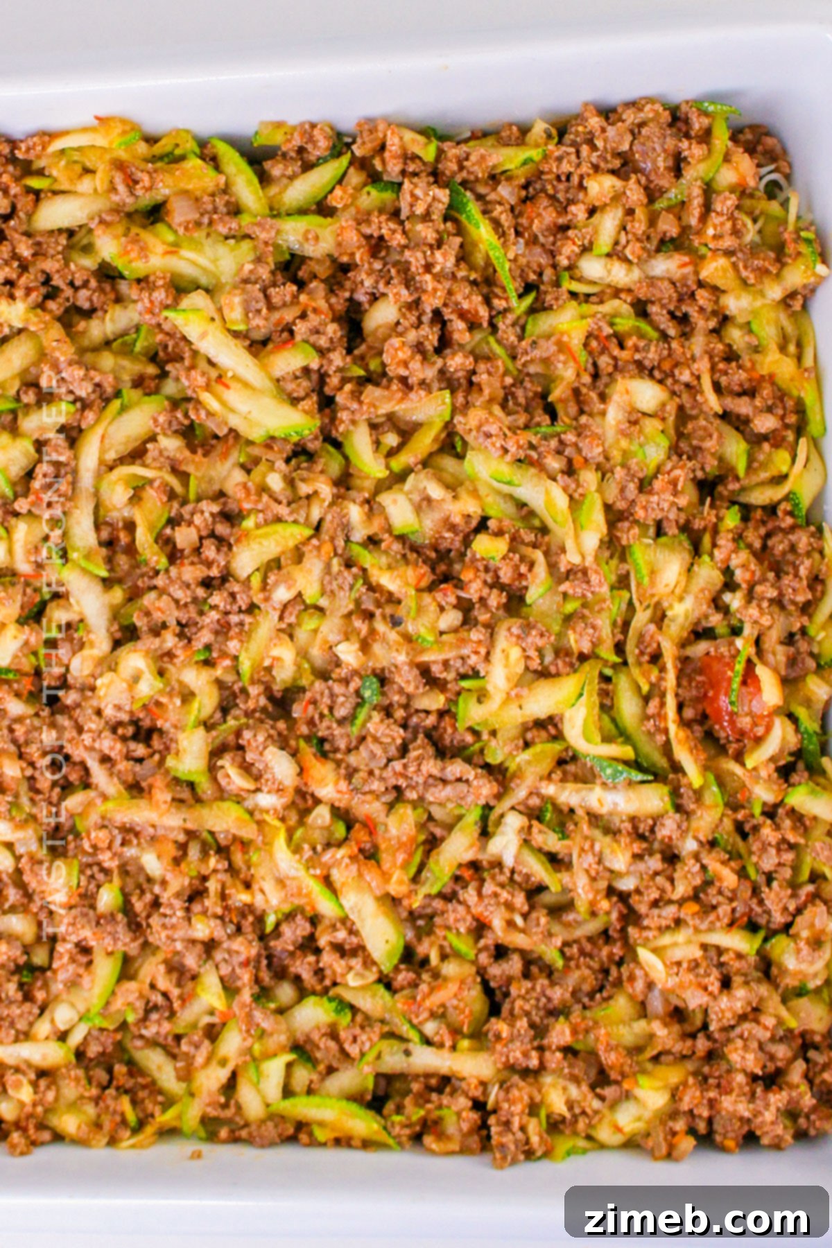Hearty Zucchini Beef Bake 8 Zucchini Ground Beef Casserole ready to bake