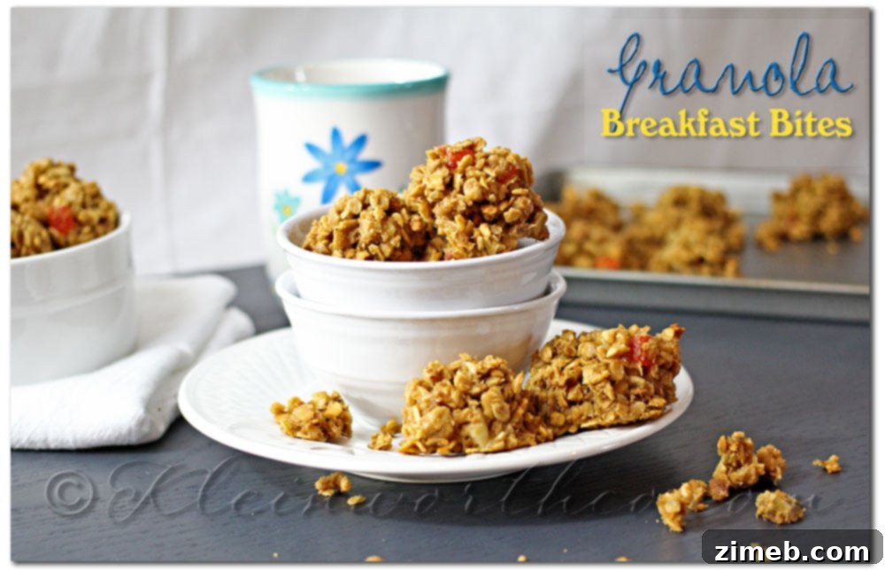 Close-up of freshly baked Granola Breakfast Bites on a baking sheet.