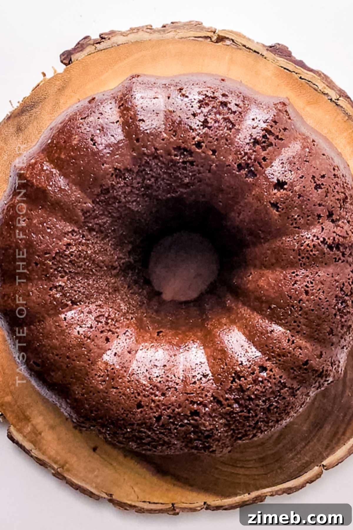 Decadent Molten Chocolate Bundt Cake 7 Baked chocolate bundt cake cooling on a rack