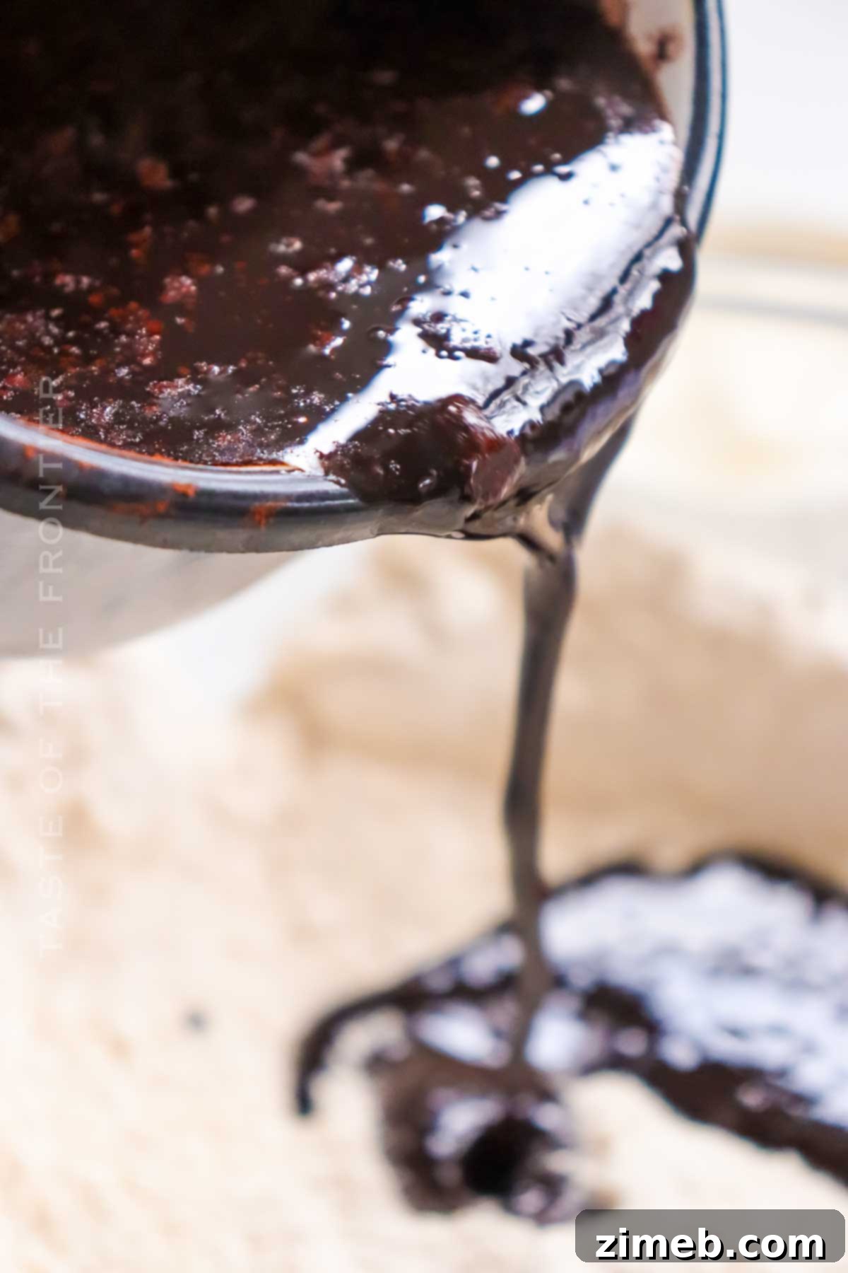 Texas Sheet Cake 5 pouring in the chocolate