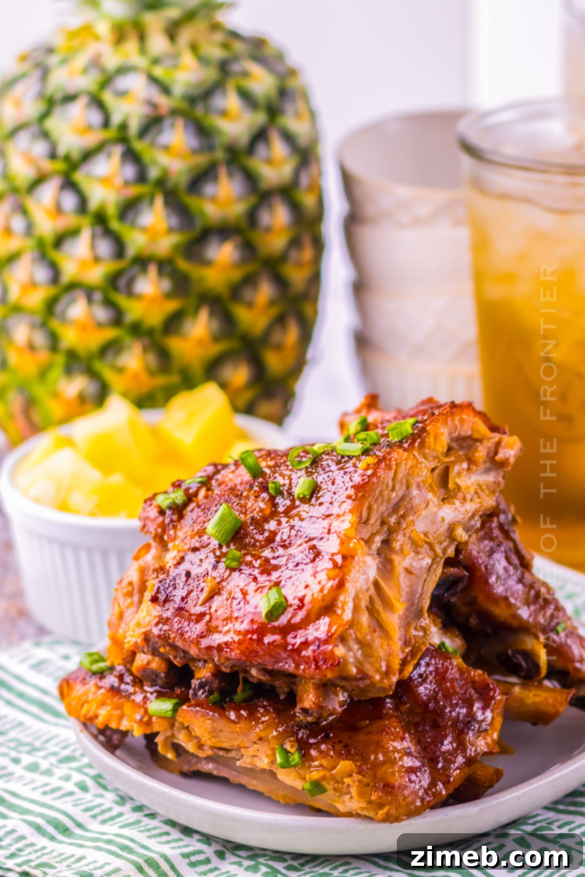 Effortless Island Ribs 3 Platter of juicy baby back ribs ready for dinner.