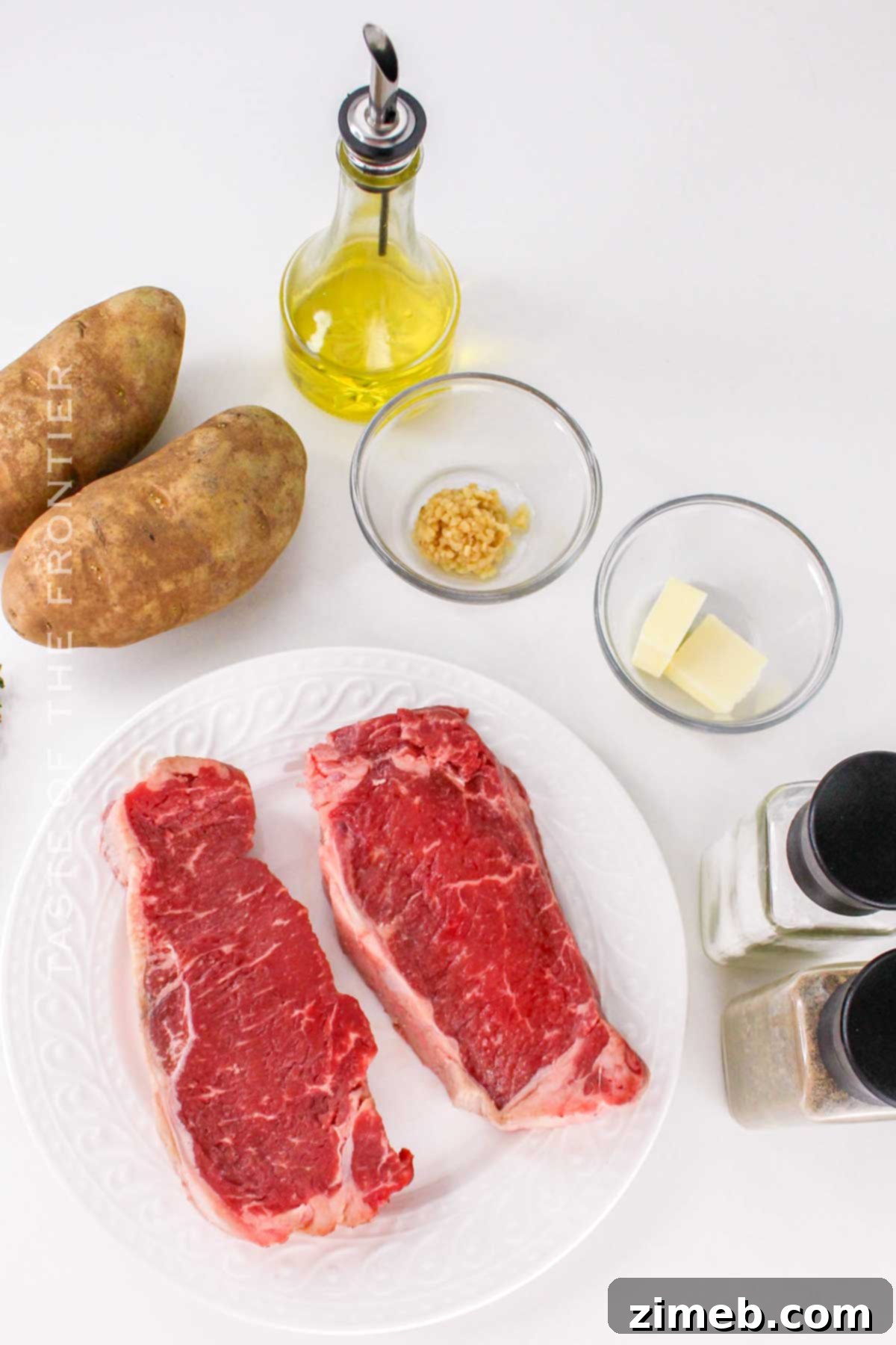 Steak Frites ingredients laid out for cooking