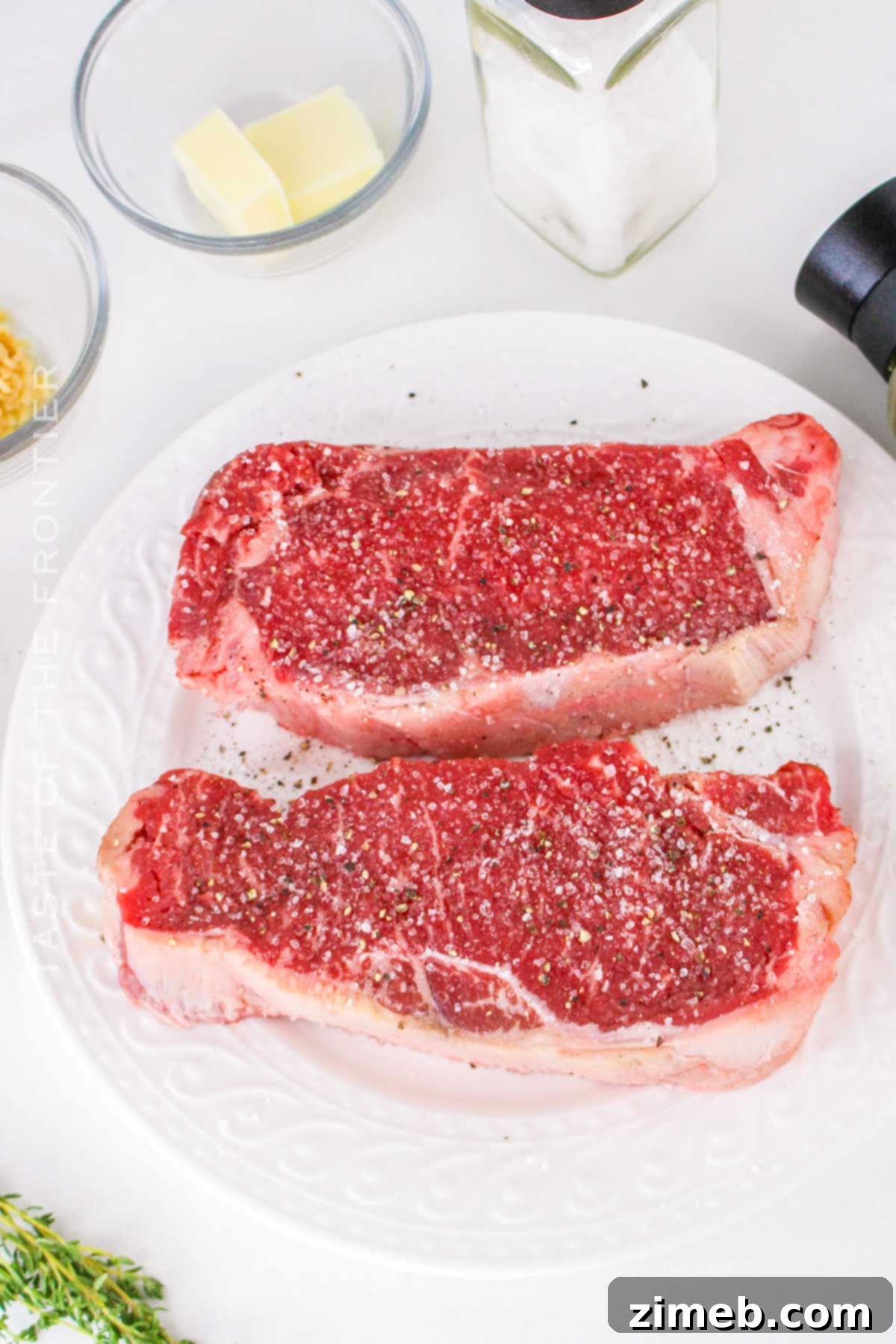 Seasoning the beef generously with salt and pepper