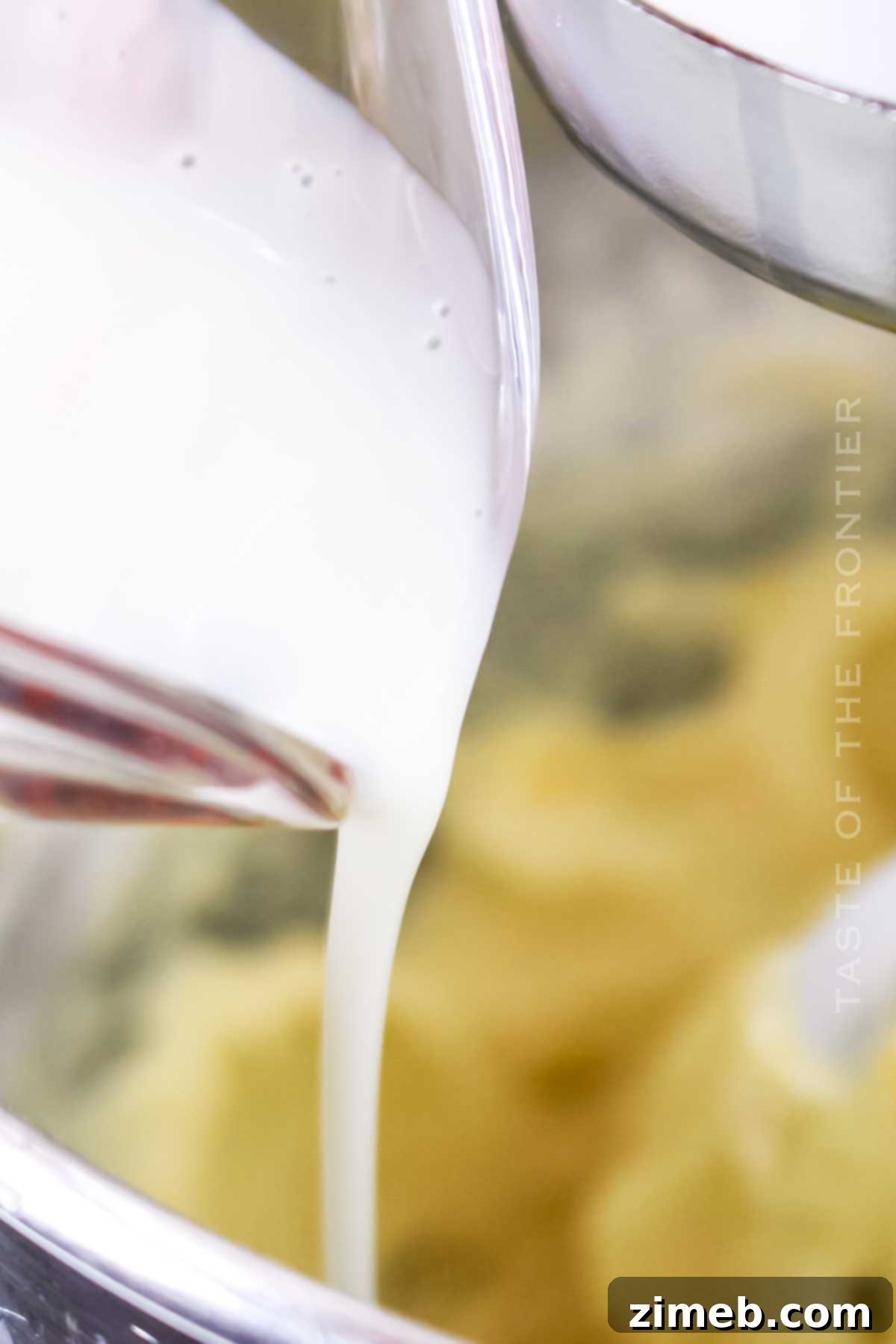 Adding buttermilk and lemon juice to the cake batter