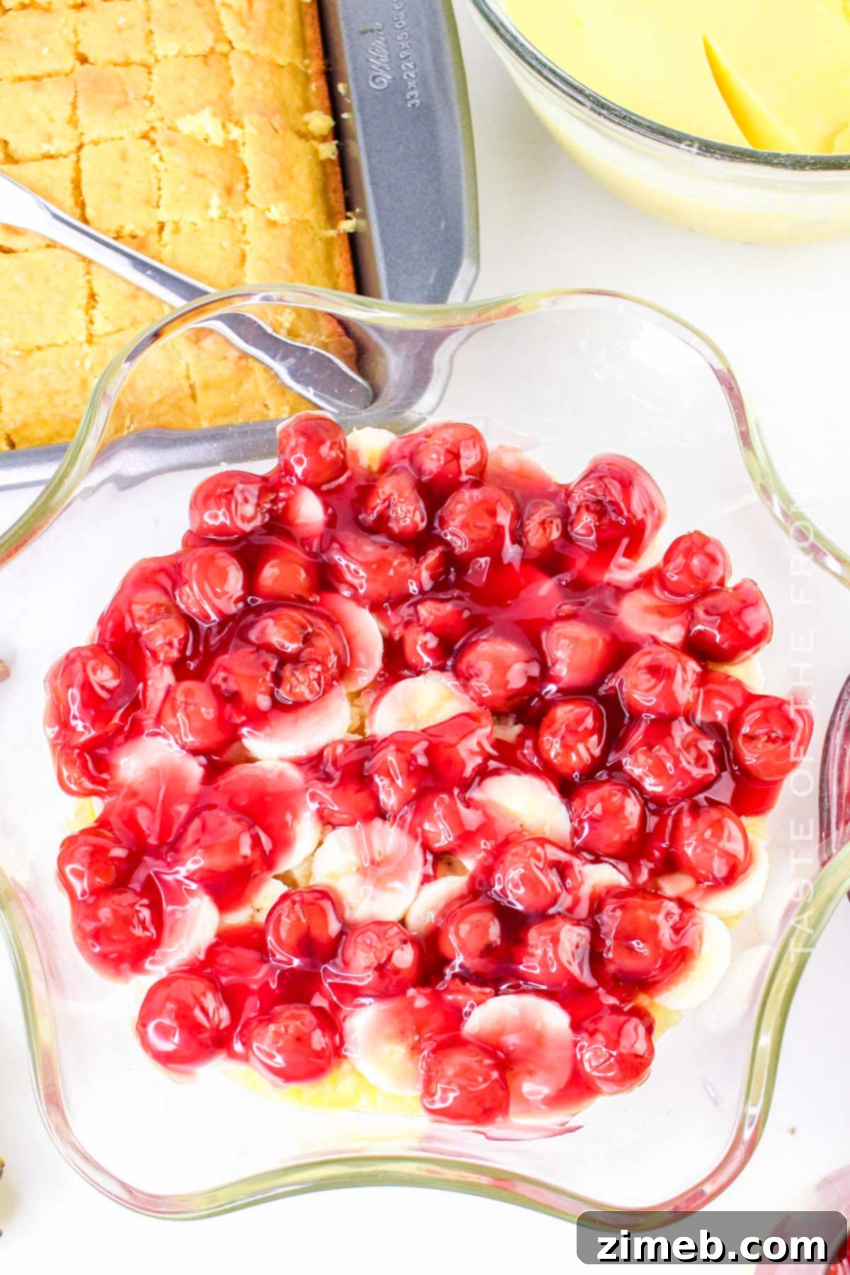 Showstopping Party Dessert Bowl 7 Cherry pie filling layer in Punch Bowl Cake