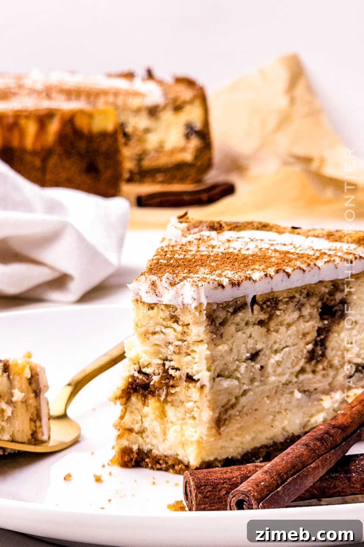 Full Cinnamon Roll Cheesecake recipe with frosting