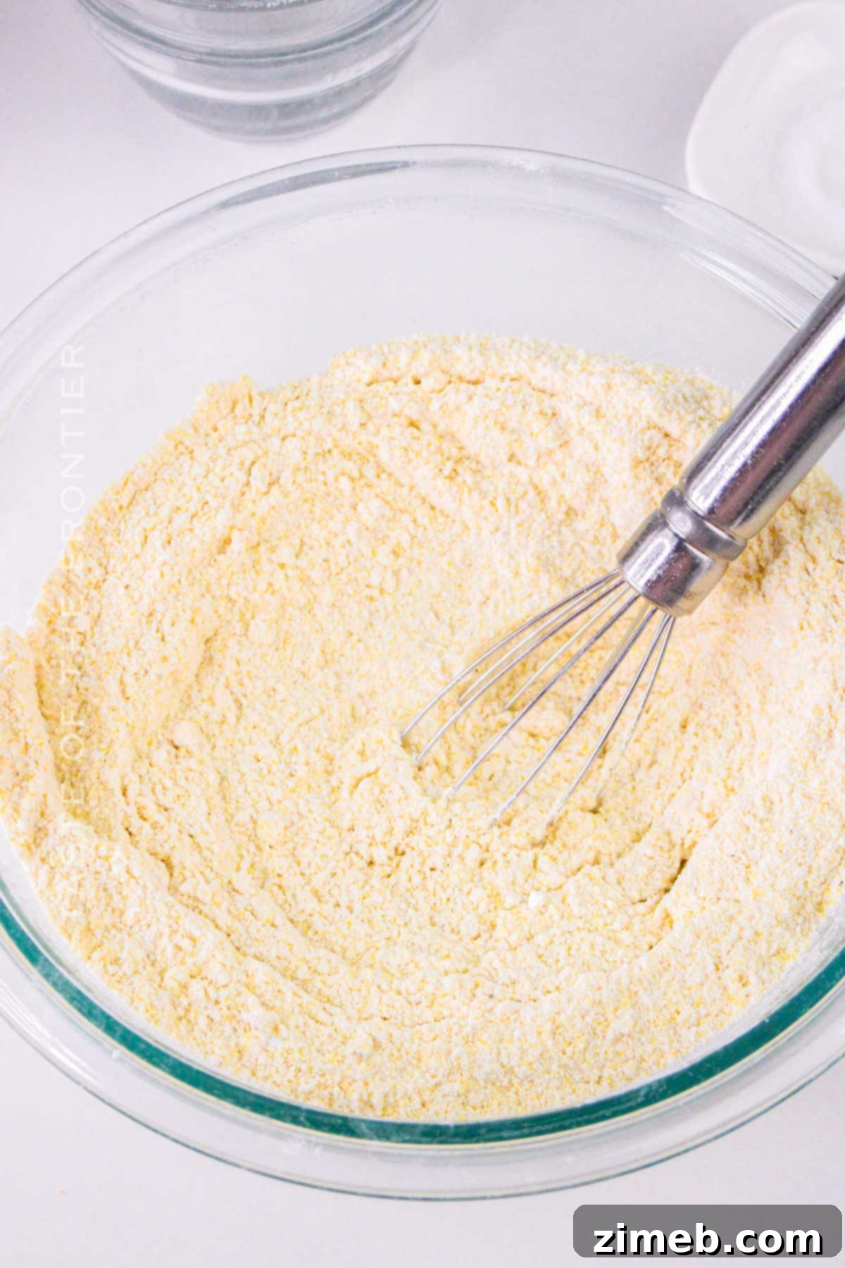 The Ultimate Air Fryer Cornbread 5 mixing the cornmeal