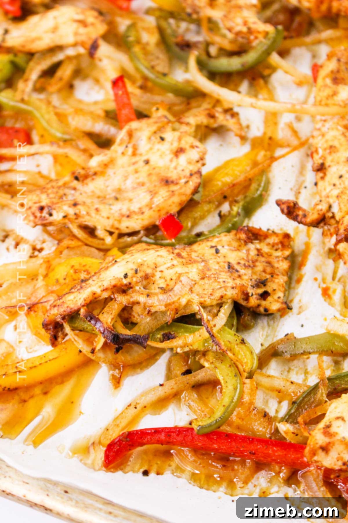 Sizzling Chicken Fajita Wraps 7 Baked fajitas on a sheet pan, ready to be wrapped.
