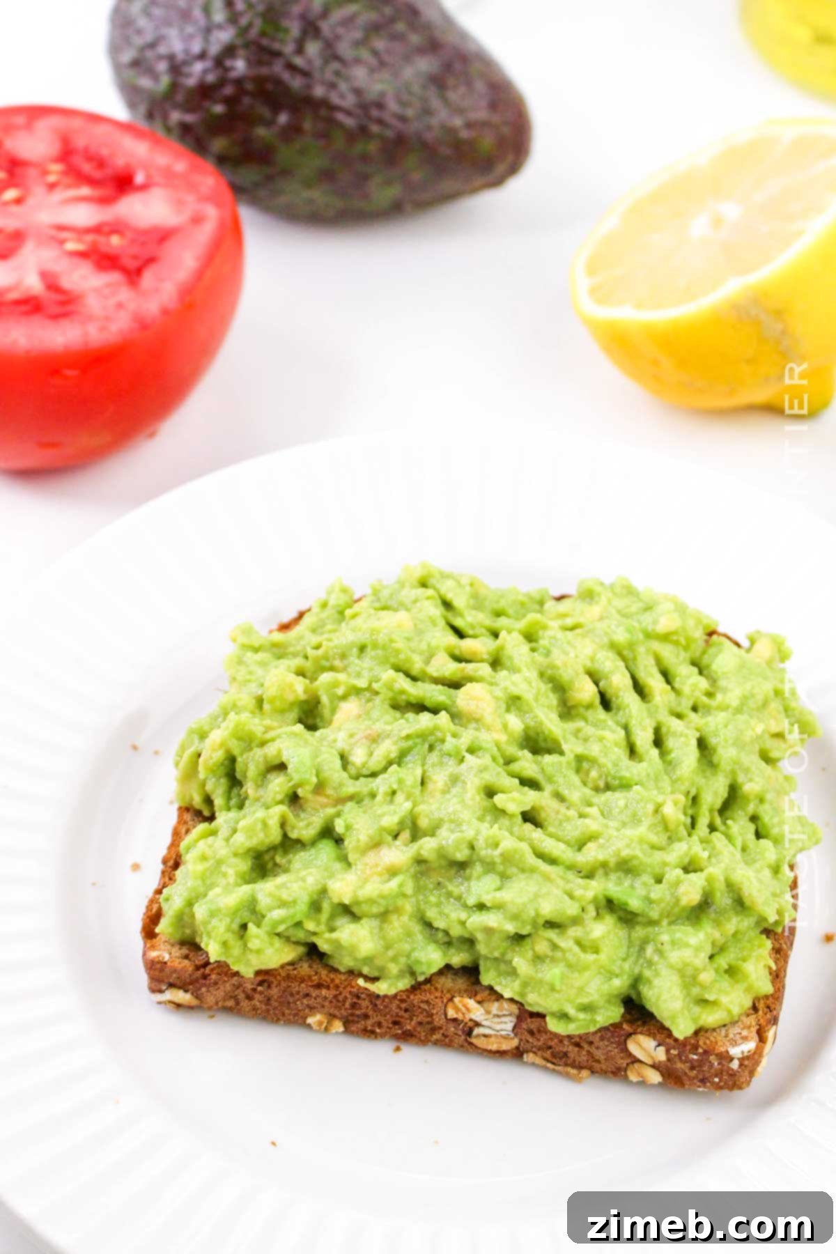 Smashed Avocado Toast with Fresh Tomato 7 how to make Avocado Toast with Tomato