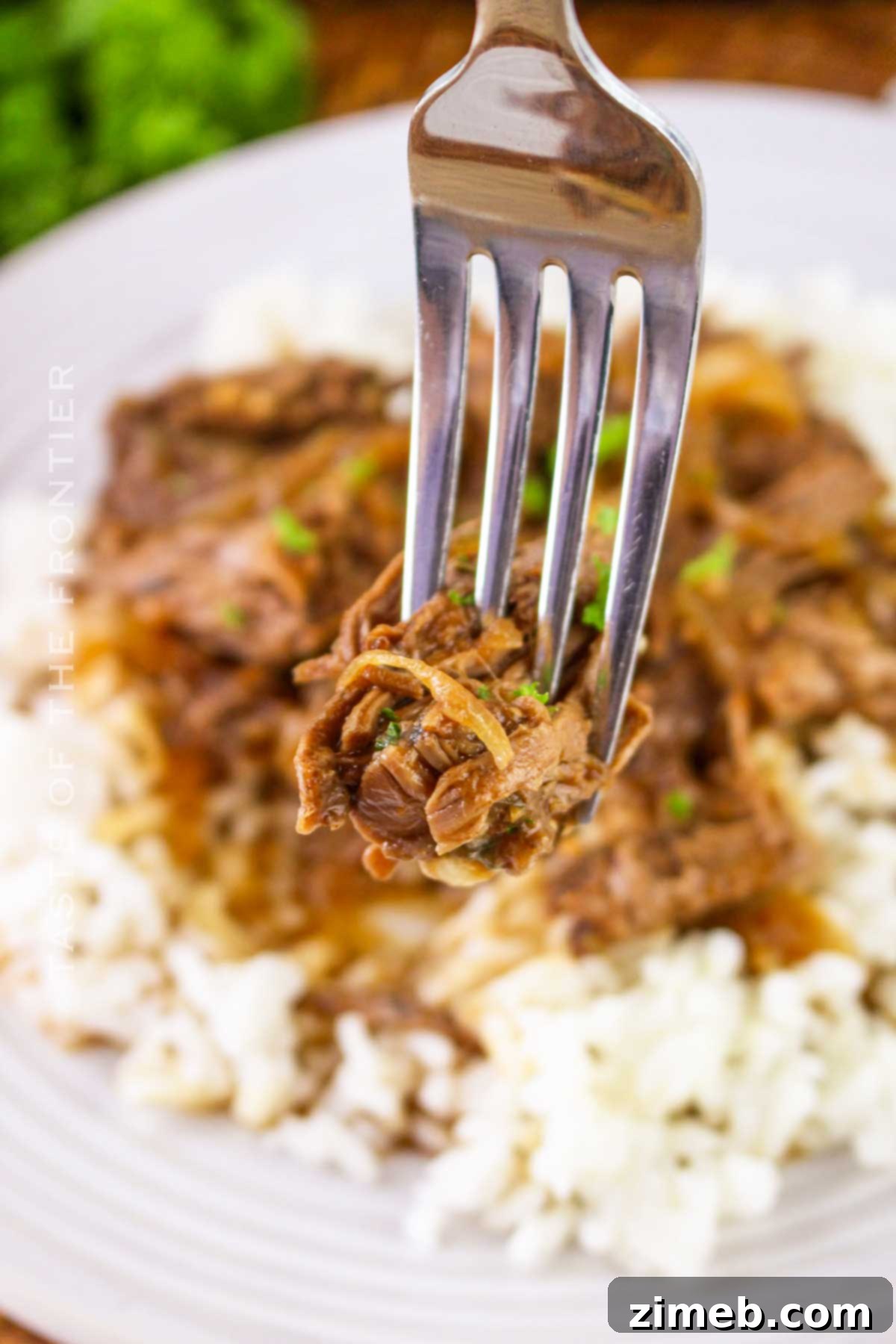 Tender Braised Steak with Caramelized Onions 15 Final plated Braised Steak and Onions recipe, garnished and ready.