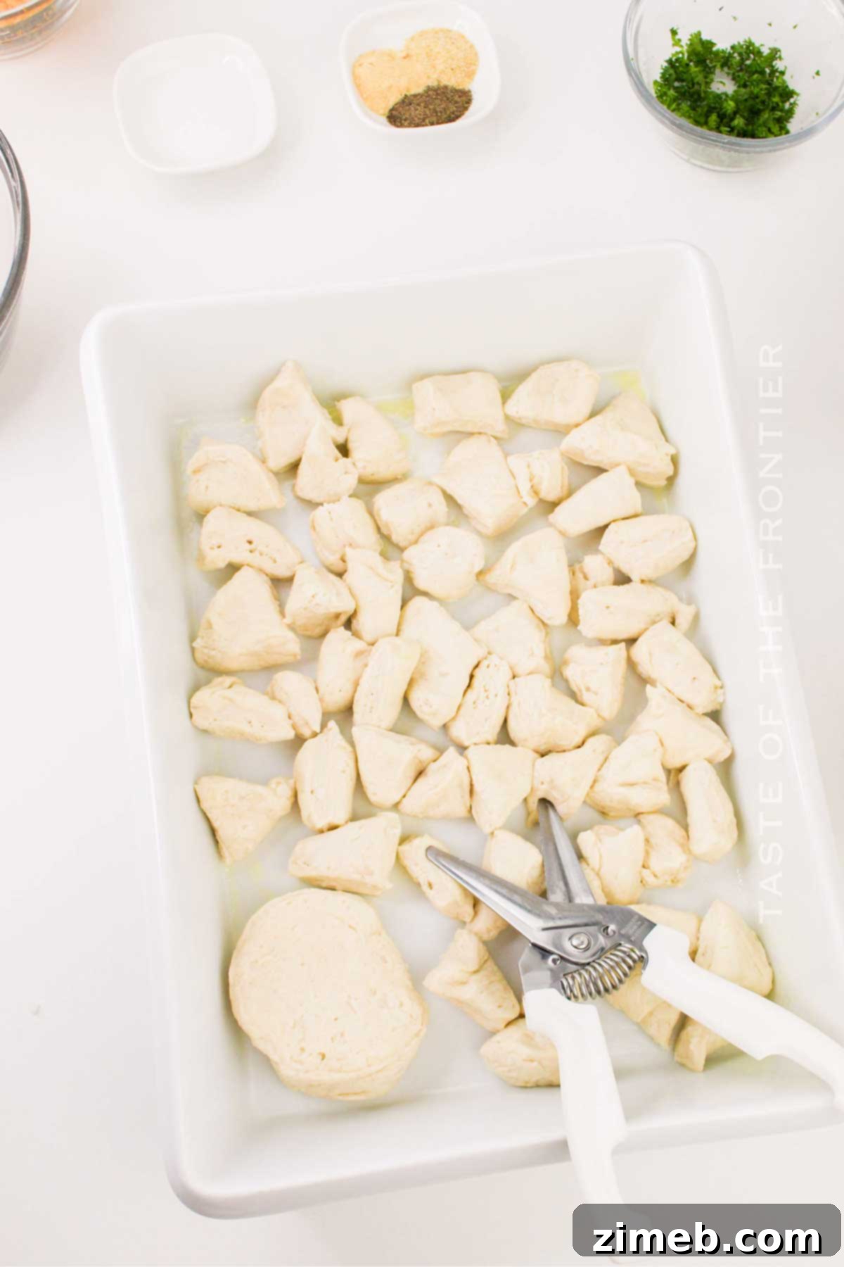 Ultimate Biscuit Breakfast Bake 5 preparing the dough