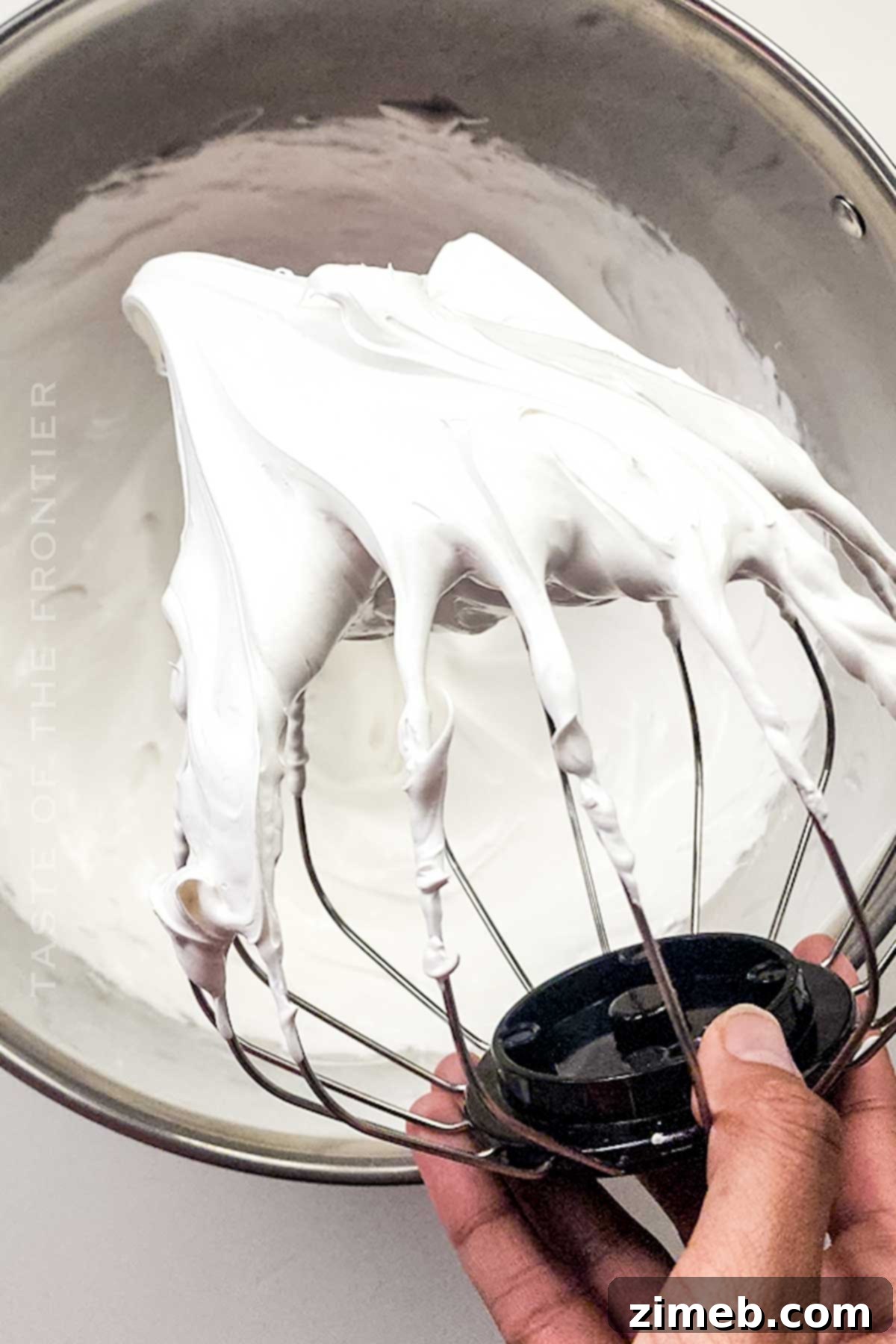 Spooktacular Cheesecake 6 Ghostly meringue topping adorns a Halloween Cheesecake.