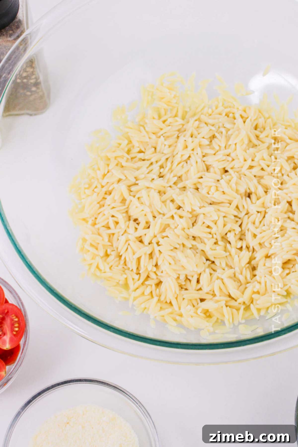 Vibrant Pesto Orzo Medley 5 Preparing orzo pasta by rinsing under cold water