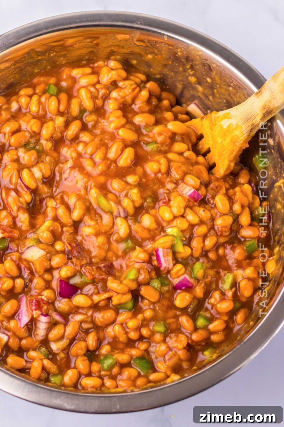 Aloha Pineapple Baked Beans 6 mixing the ingredients