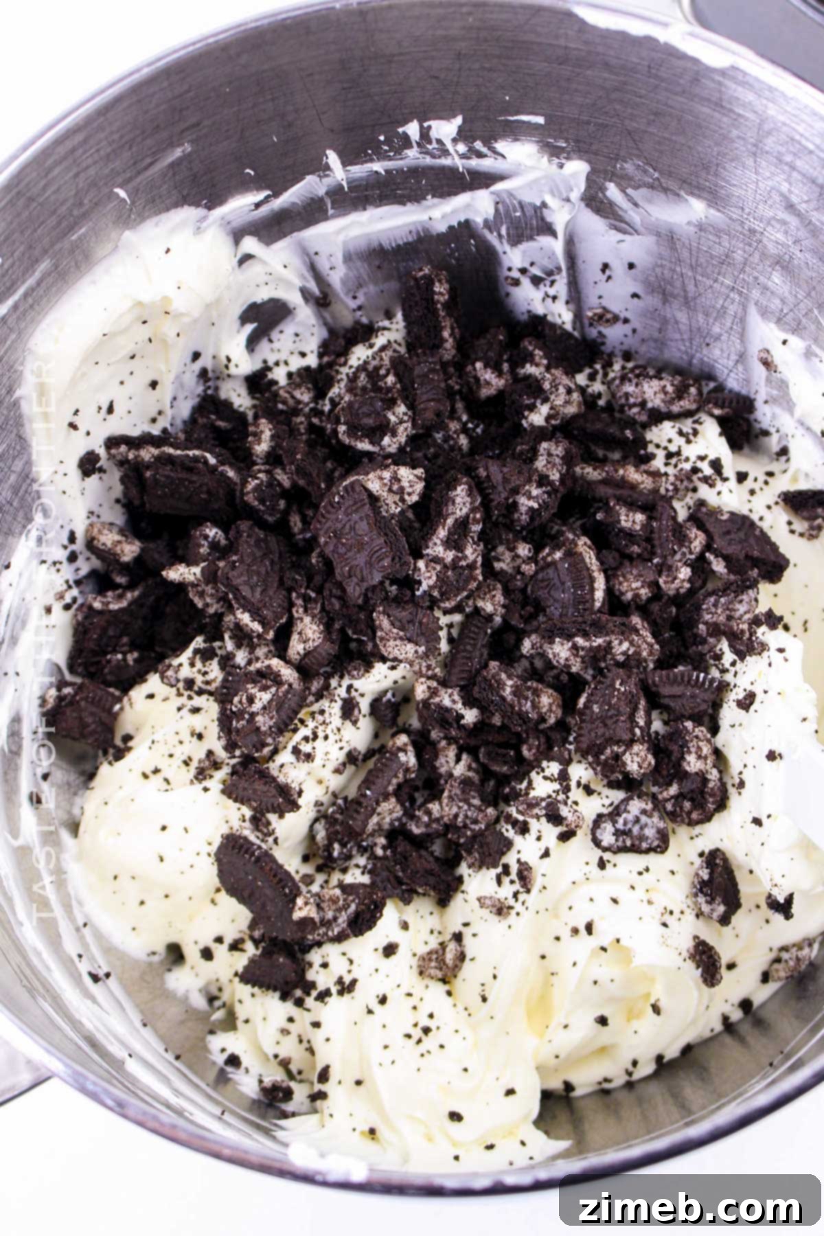 Oreo Dream Cheesecake 6 How to make No Bake Oreo Cheesecake - pouring filling