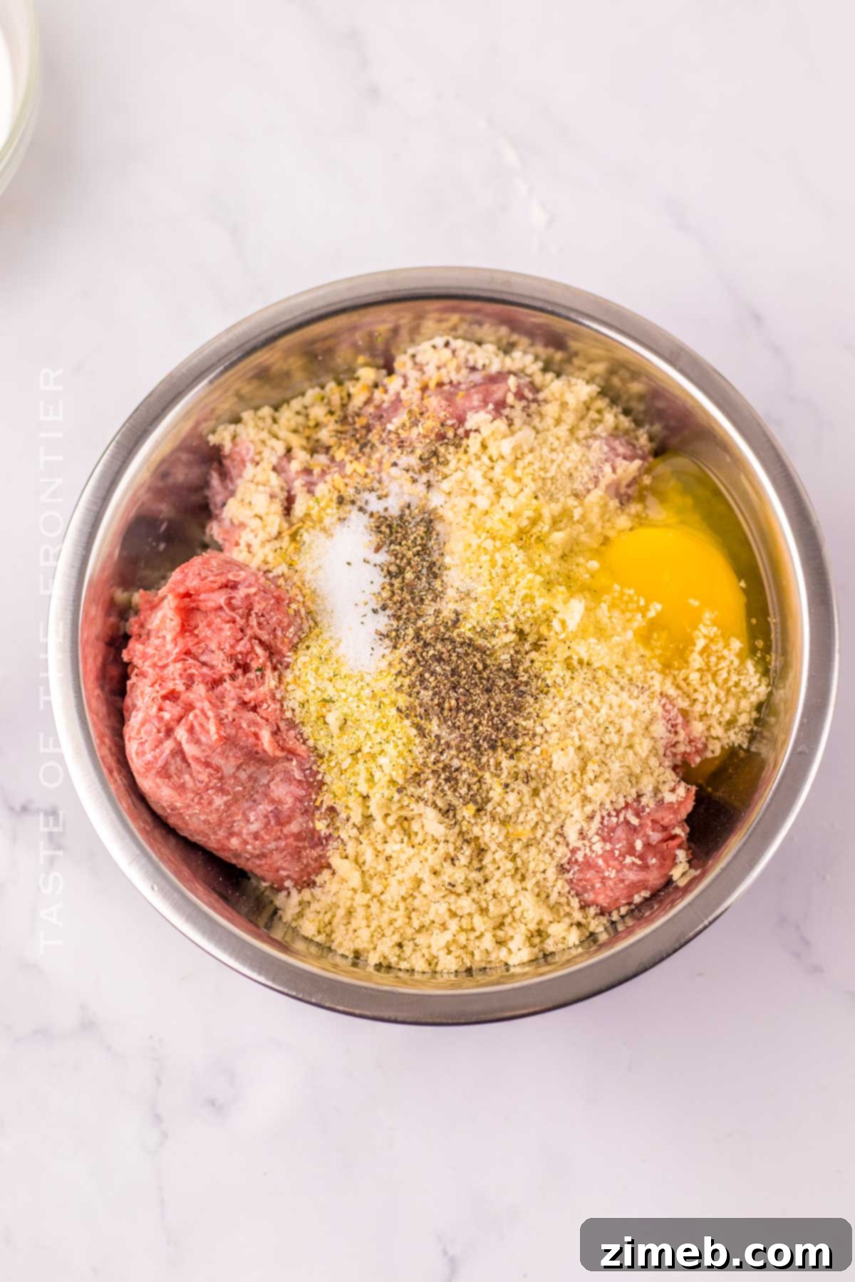 Recreating Ikea's Beloved Swedish Meatballs at Home 5 Mixing ingredients for homemade meatballs